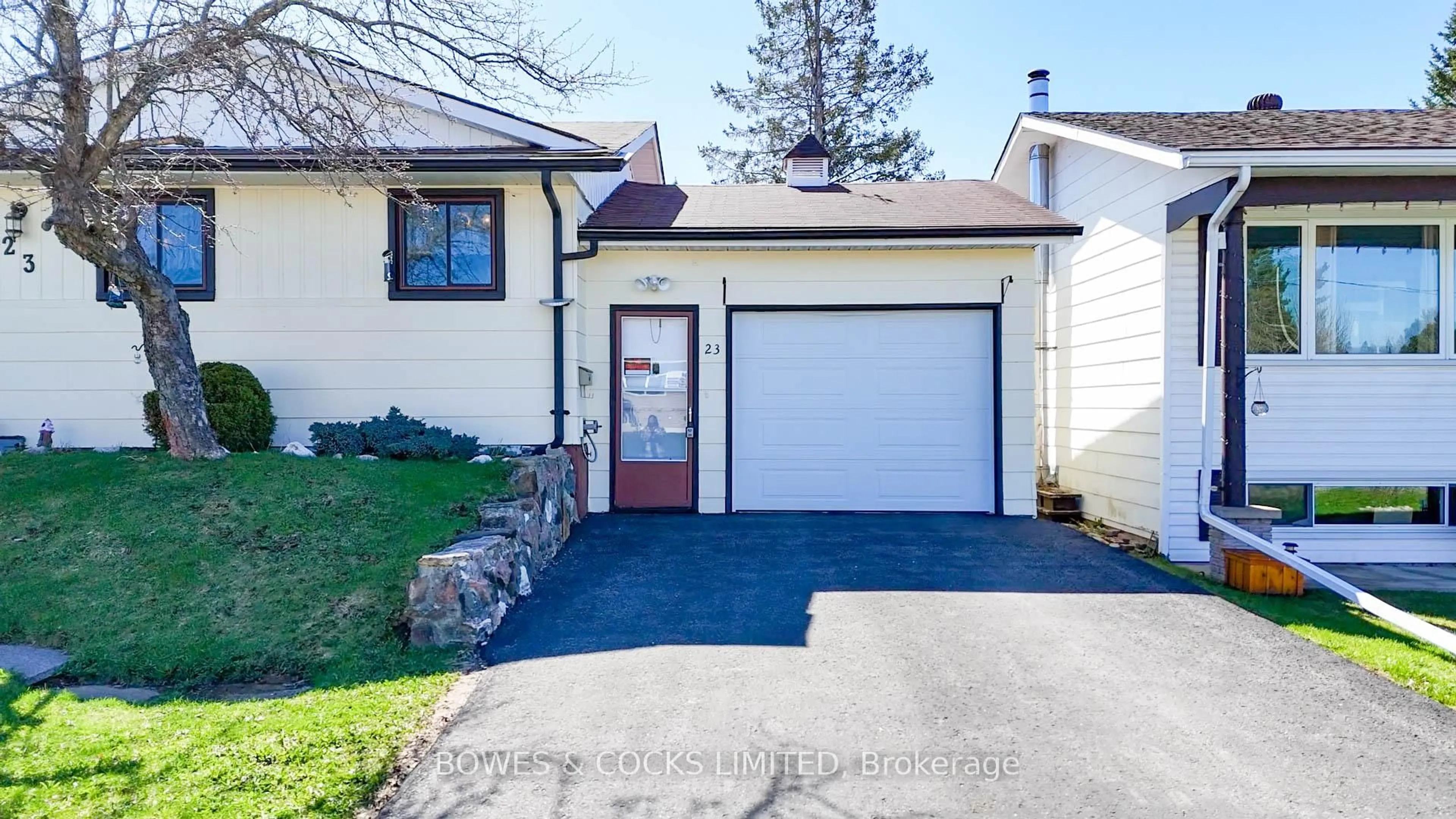 Home with vinyl exterior material, street for 23 Hemlock St, Highlands East Ontario K0L 1M0