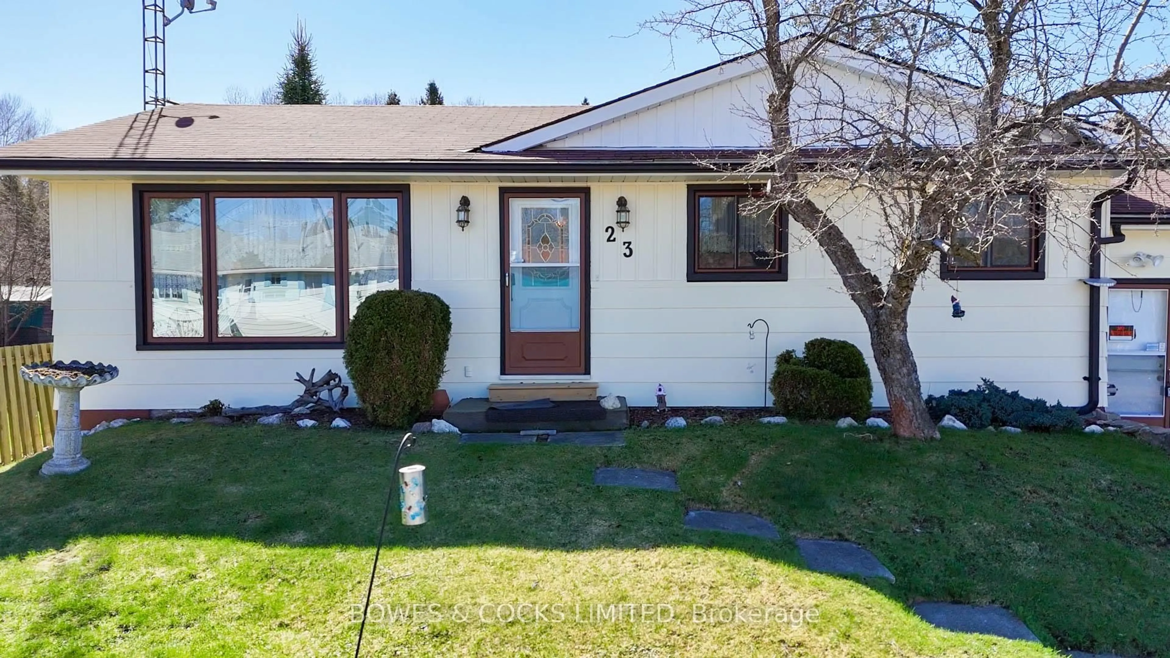 Home with vinyl exterior material, street for 23 Hemlock St, Highlands East Ontario K0L 1M0