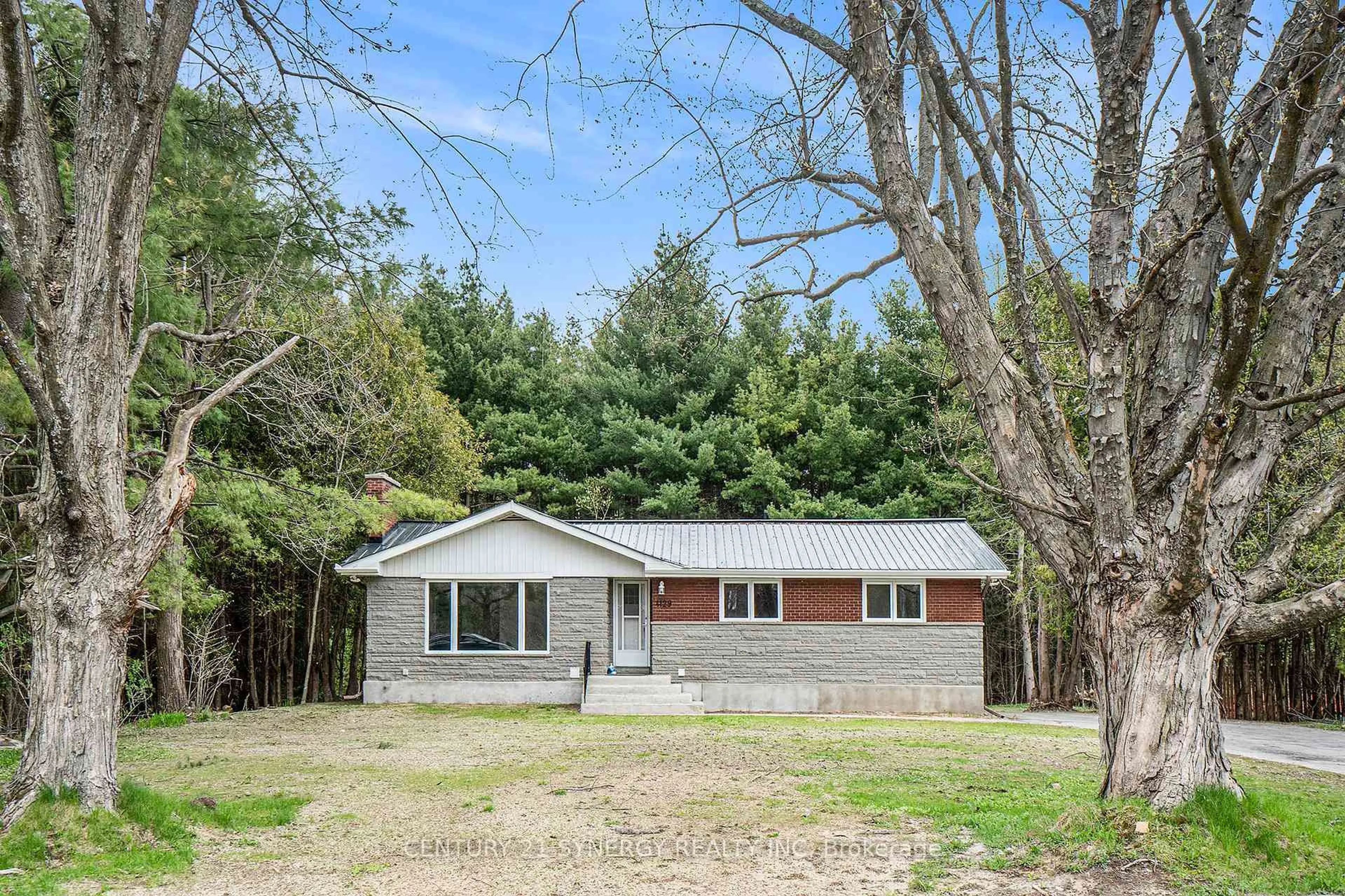 A pic from outside/outdoor area/front of a property/back of a property/a pic from drone, unknown for 4129 Ramsayville Rd, Ottawa Ontario K1G 3N4