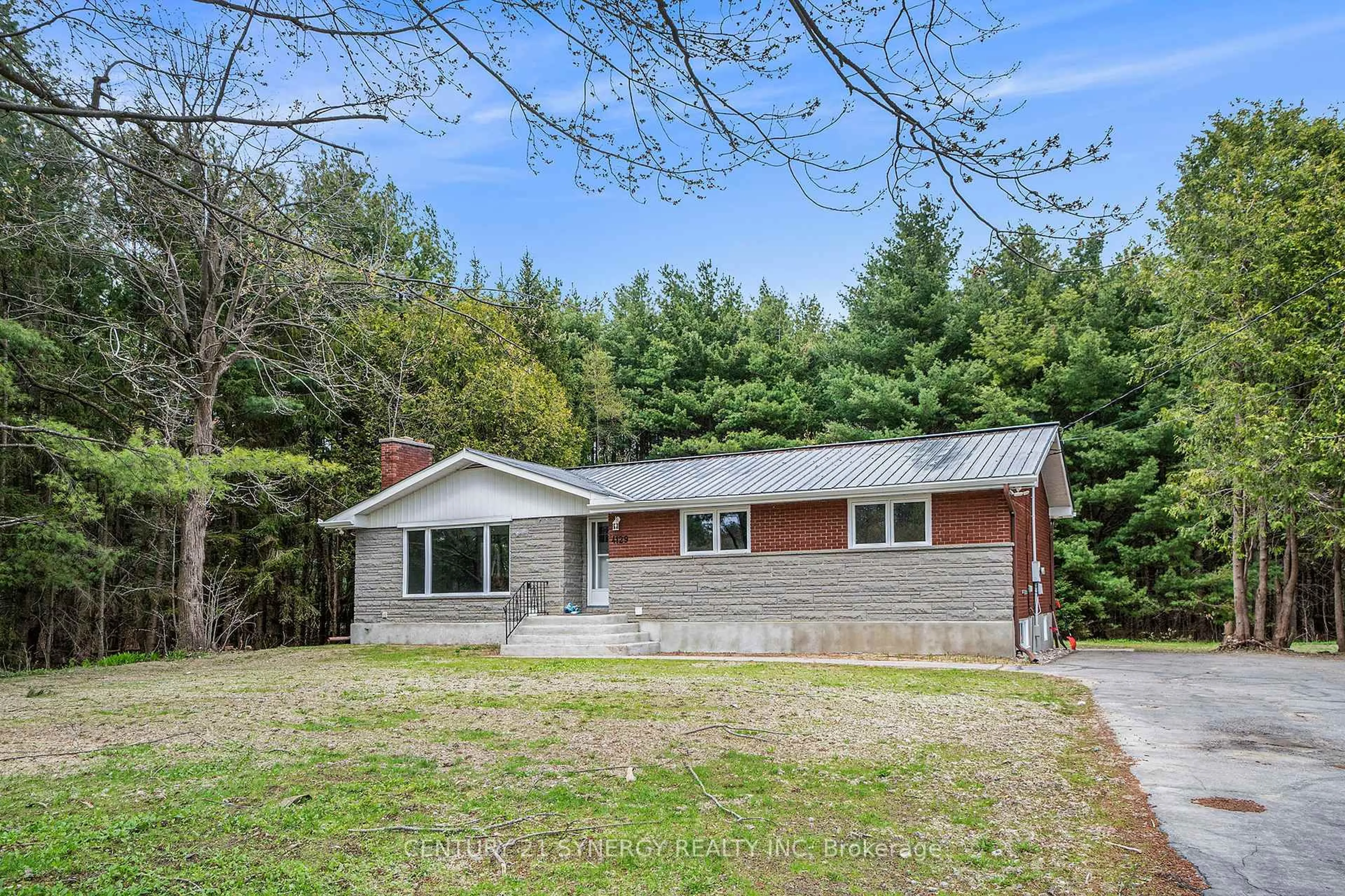 Home with vinyl exterior material, street for 4129 Ramsayville Rd, Ottawa Ontario K1G 3N4
