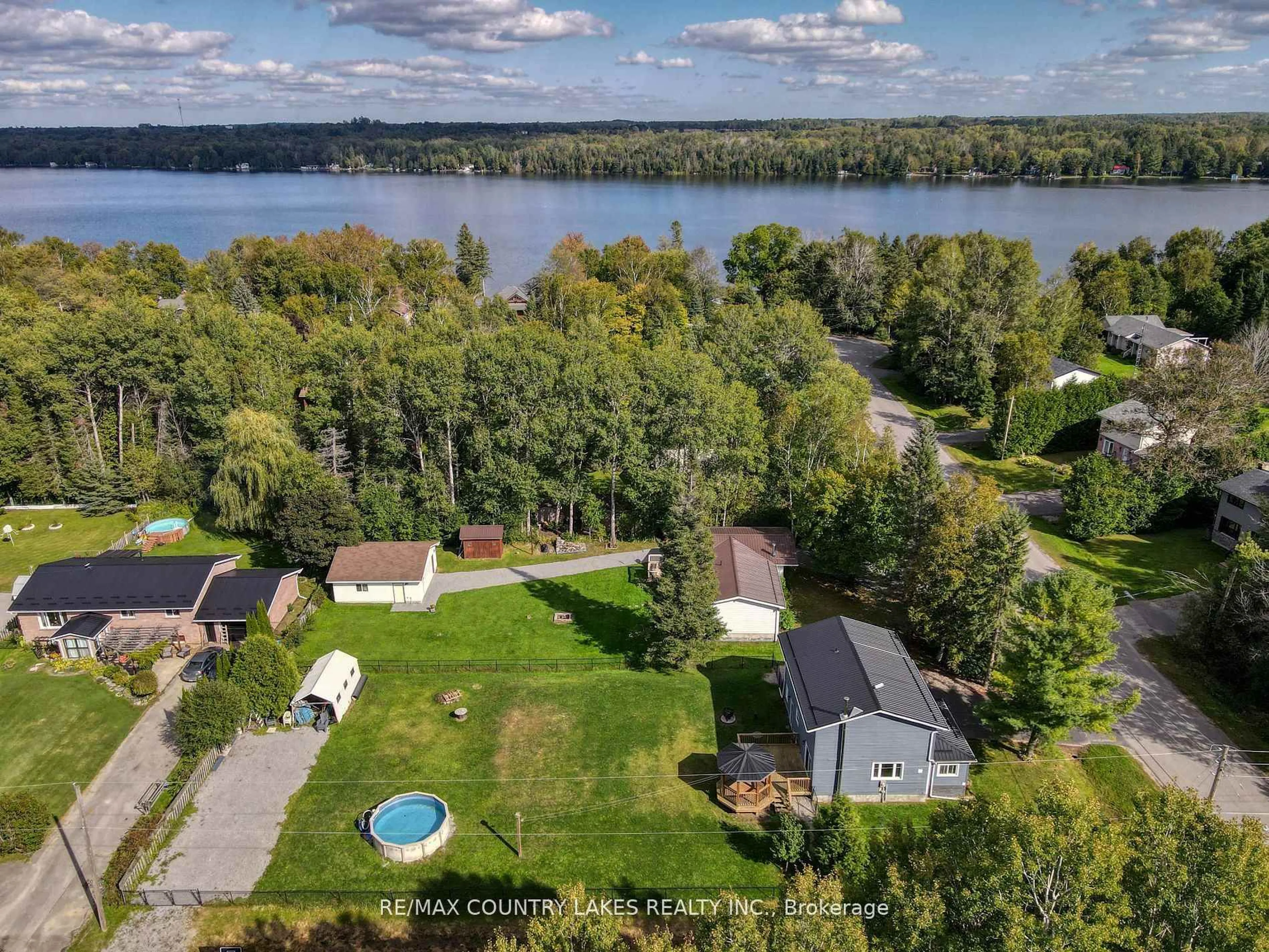 A pic from outside/outdoor area/front of a property/back of a property/a pic from drone, water/lake/river/ocean view for 3 Pinewood Blvd, Kawartha Lakes Ontario K0M 2T0