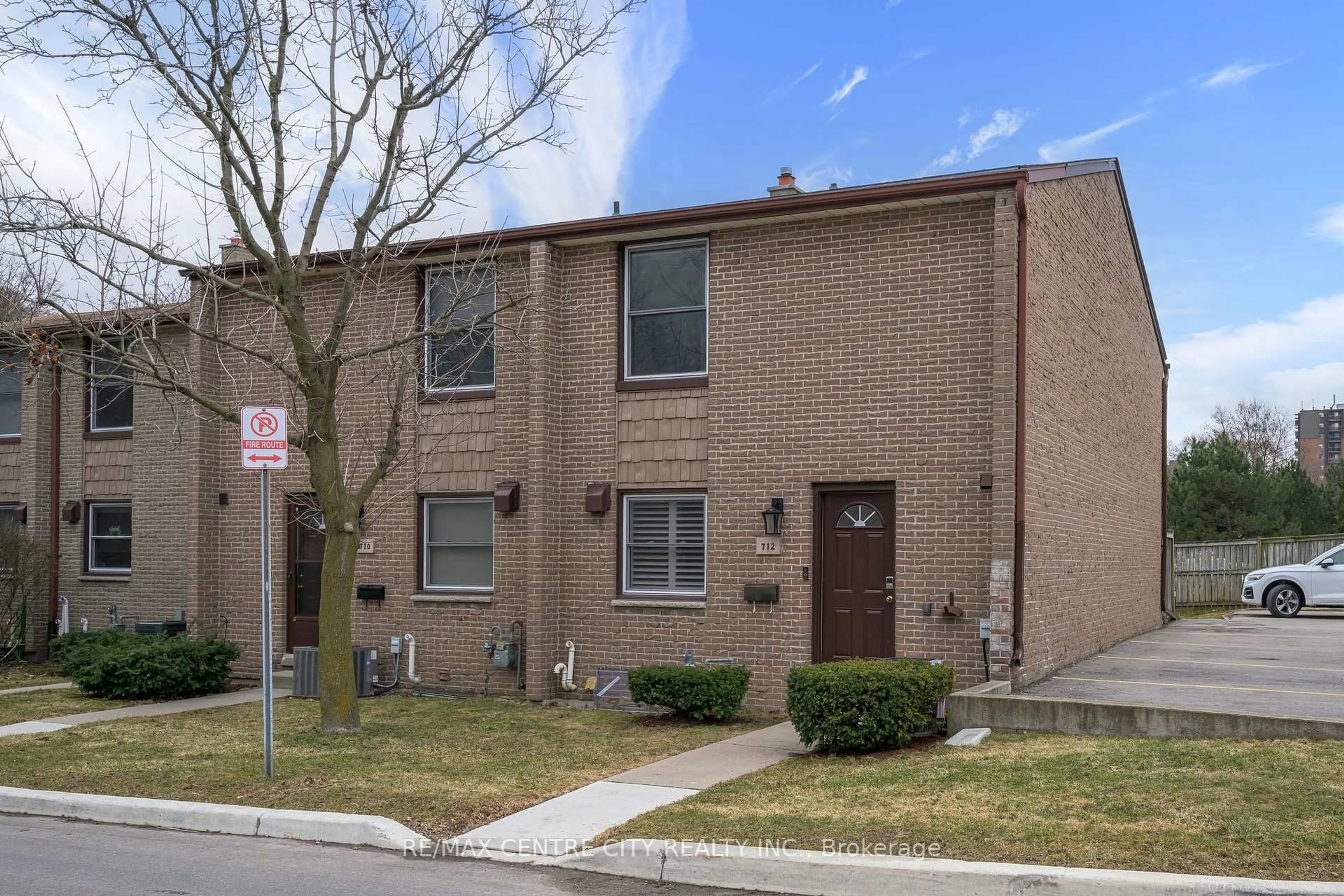 Home with brick exterior material, street for 712 Wonderland Rd, London South Ontario N6K 1L8
