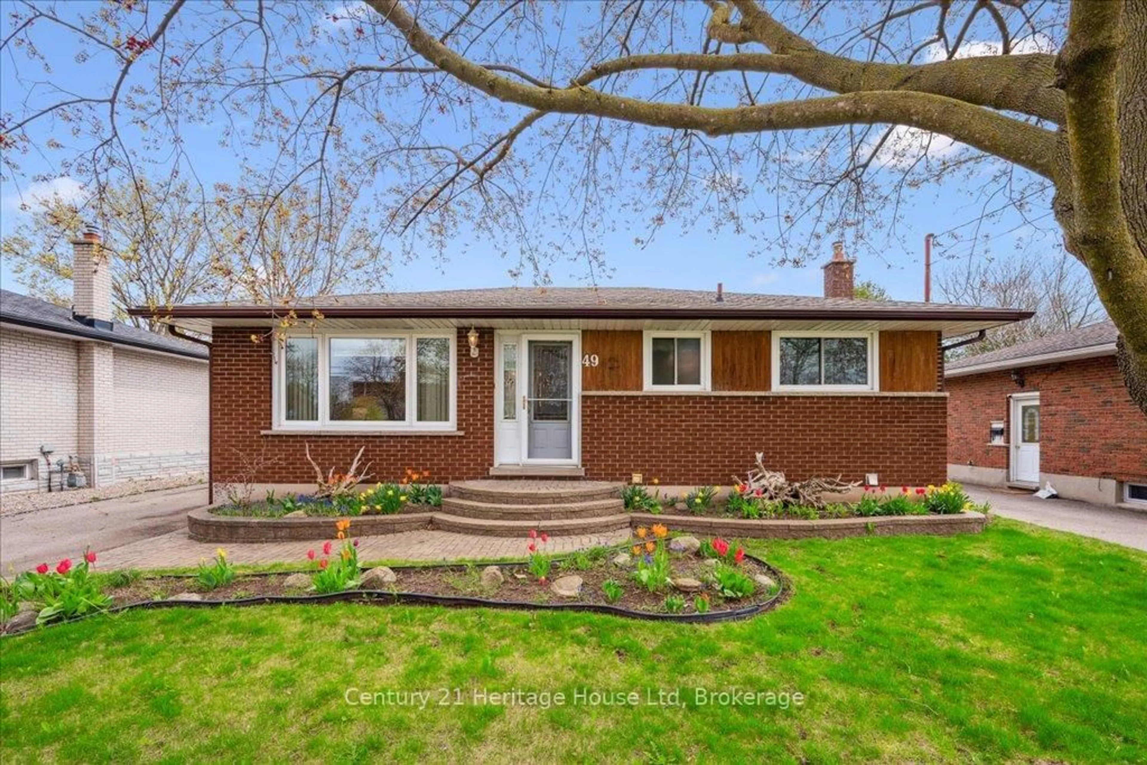Home with brick exterior material, street for 49 Sleeman Ave, Guelph Ontario N1H 6G3