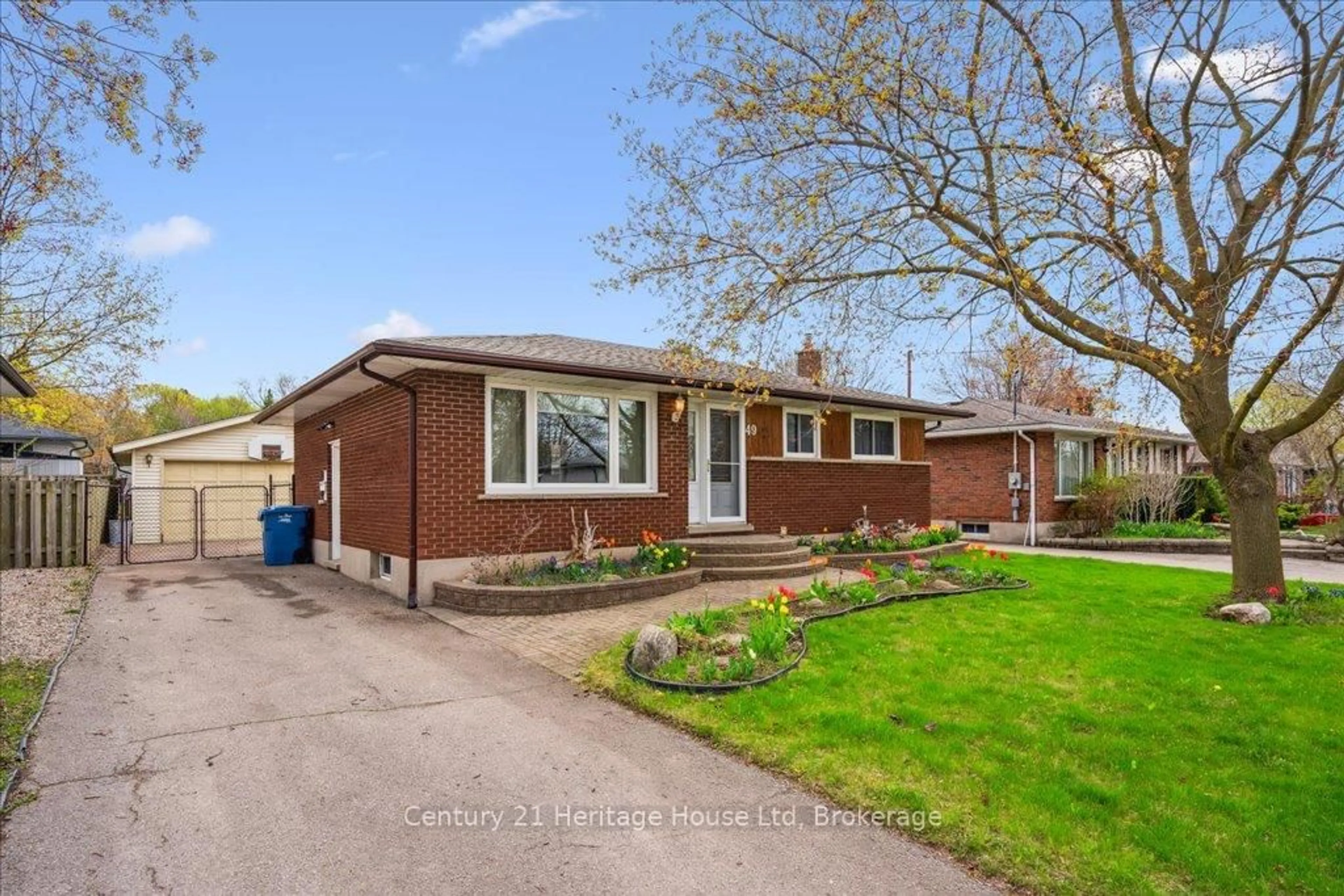 Home with brick exterior material, street for 49 Sleeman Ave, Guelph Ontario N1H 6G3