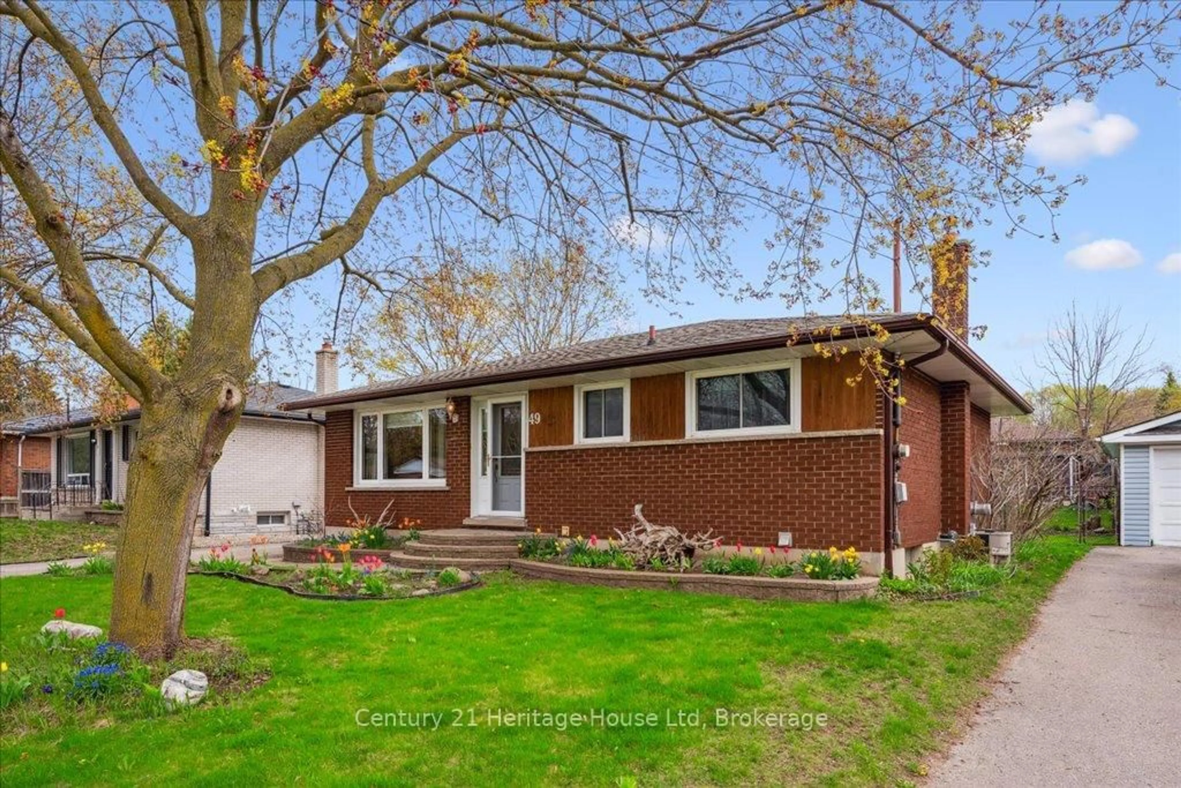 Home with brick exterior material, street for 49 Sleeman Ave, Guelph Ontario N1H 6G3