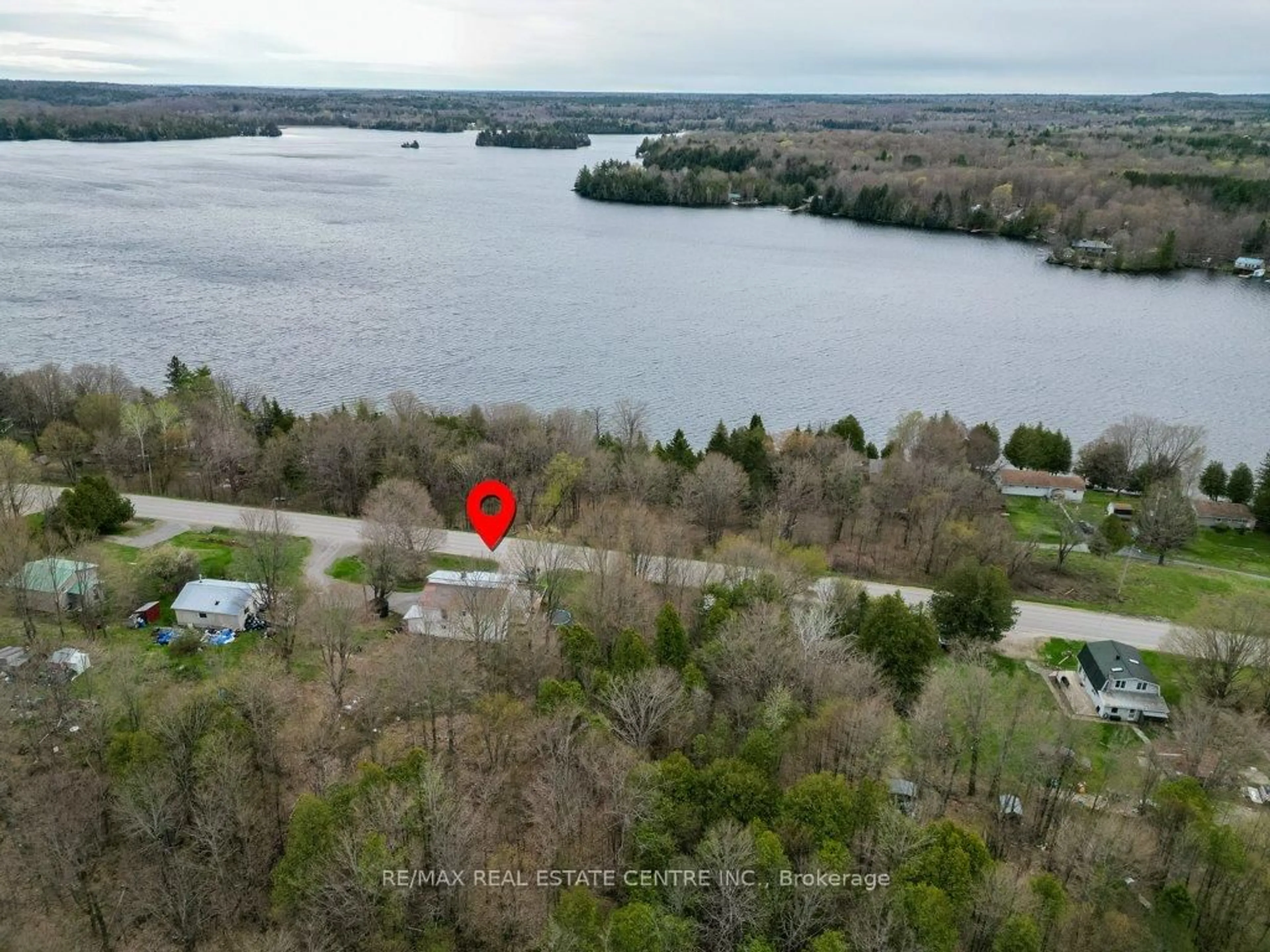A pic from outside/outdoor area/front of a property/back of a property/a pic from drone, water/lake/river/ocean view for 6167 Arden Rd, Arden Ontario K0H 1B0