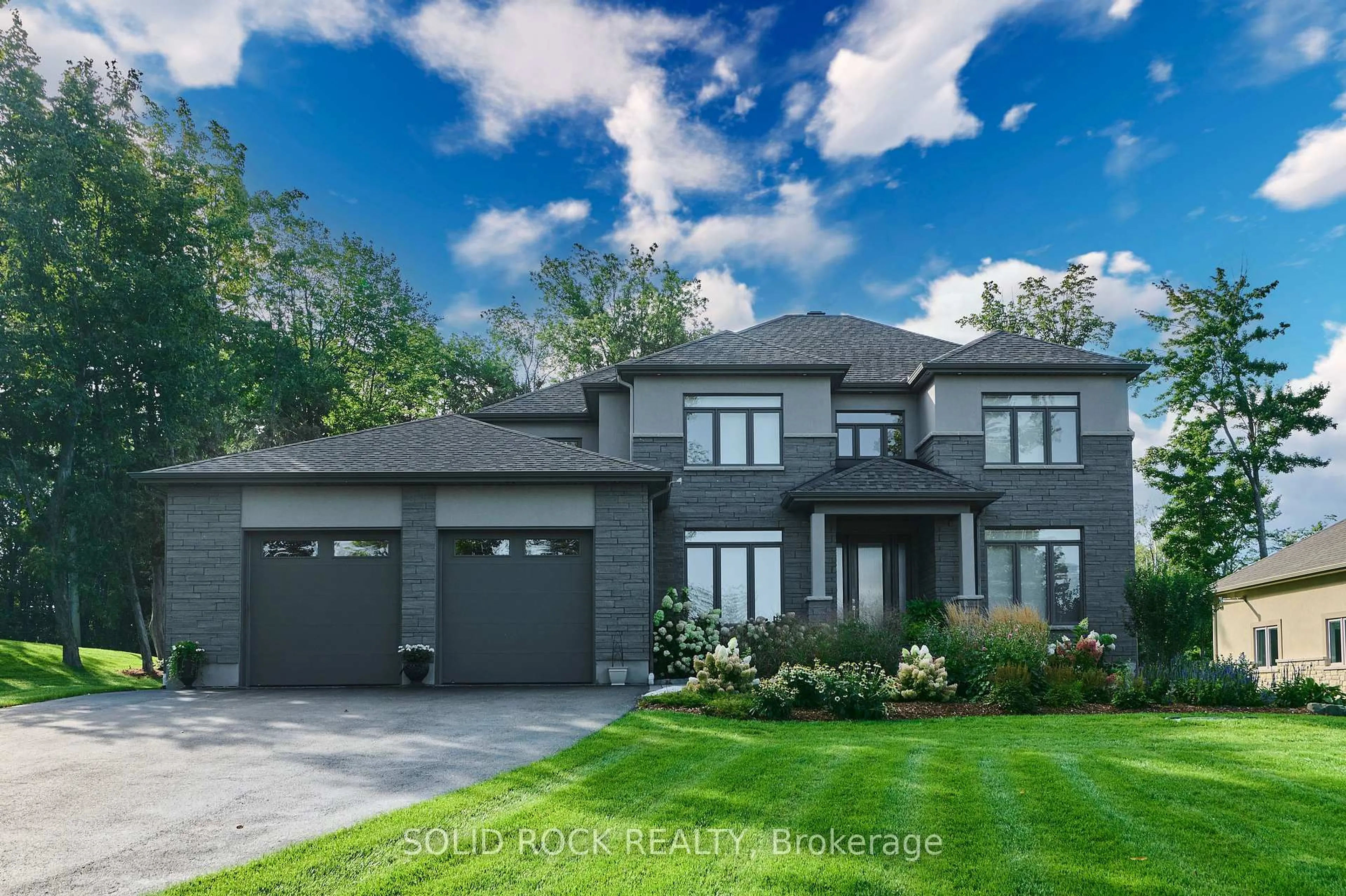 Home with brick exterior material, street for 1882 Cedarlakes Way, Ottawa Ontario K4P 0E4