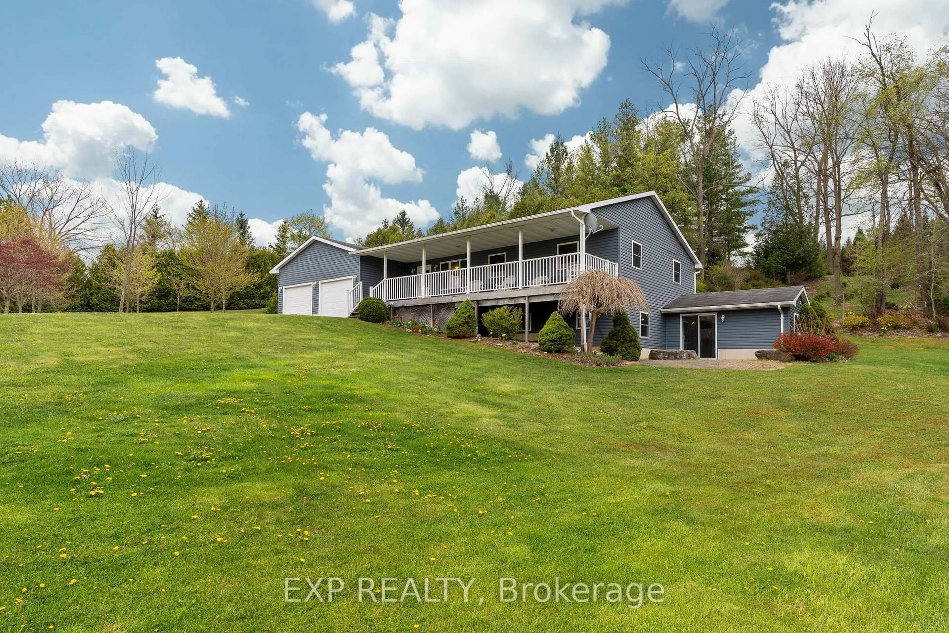 A pic from outside/outdoor area/front of a property/back of a property/a pic from drone, water/lake/river/ocean view for 30680 Hungry Hollow Rd, North Middlesex Ontario N0M 1B0