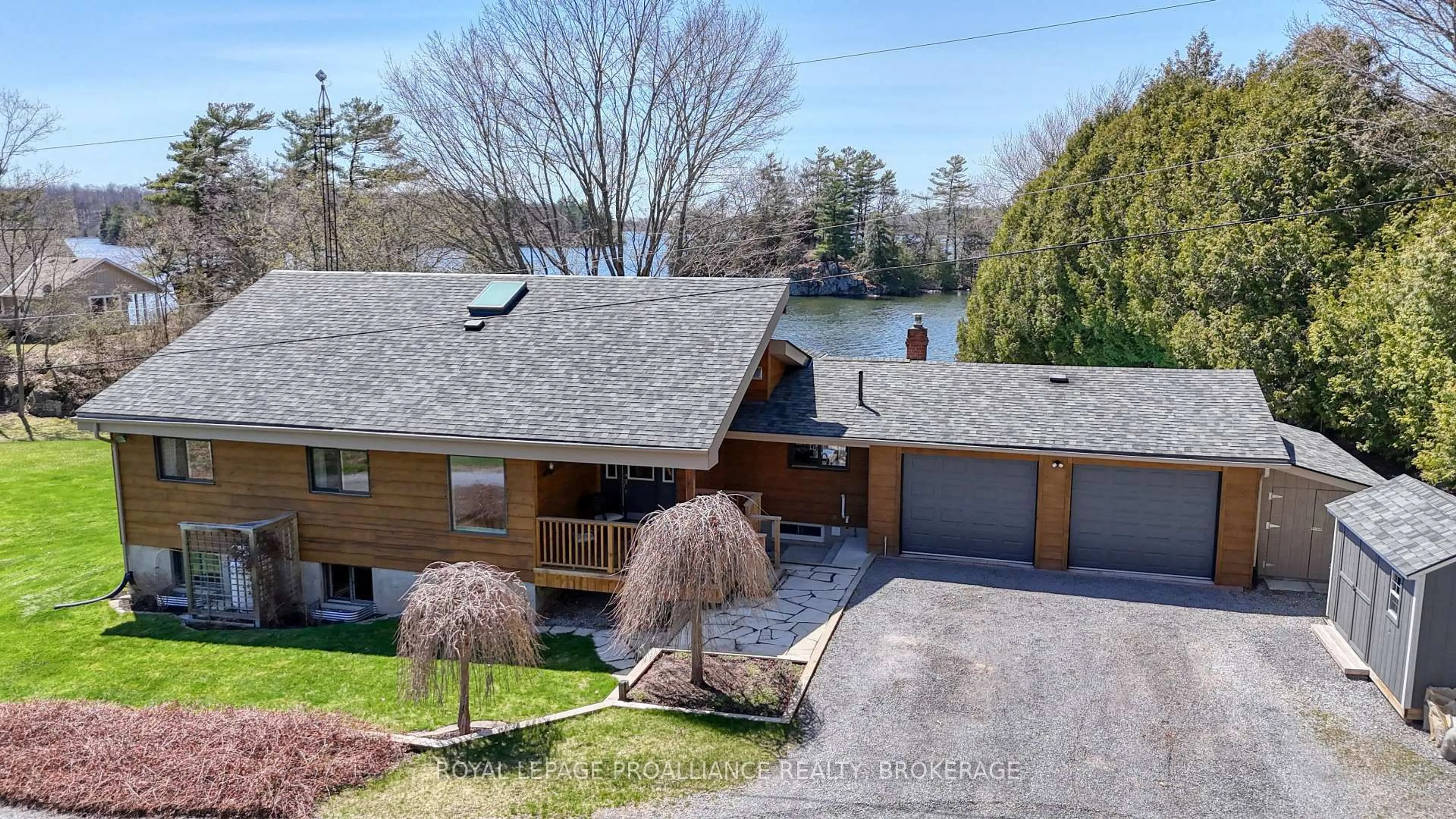 A pic from outside/outdoor area/front of a property/back of a property/a pic from drone, water/lake/river/ocean view for 4647 Jones Lane, Battersea Ontario K0H 1H0