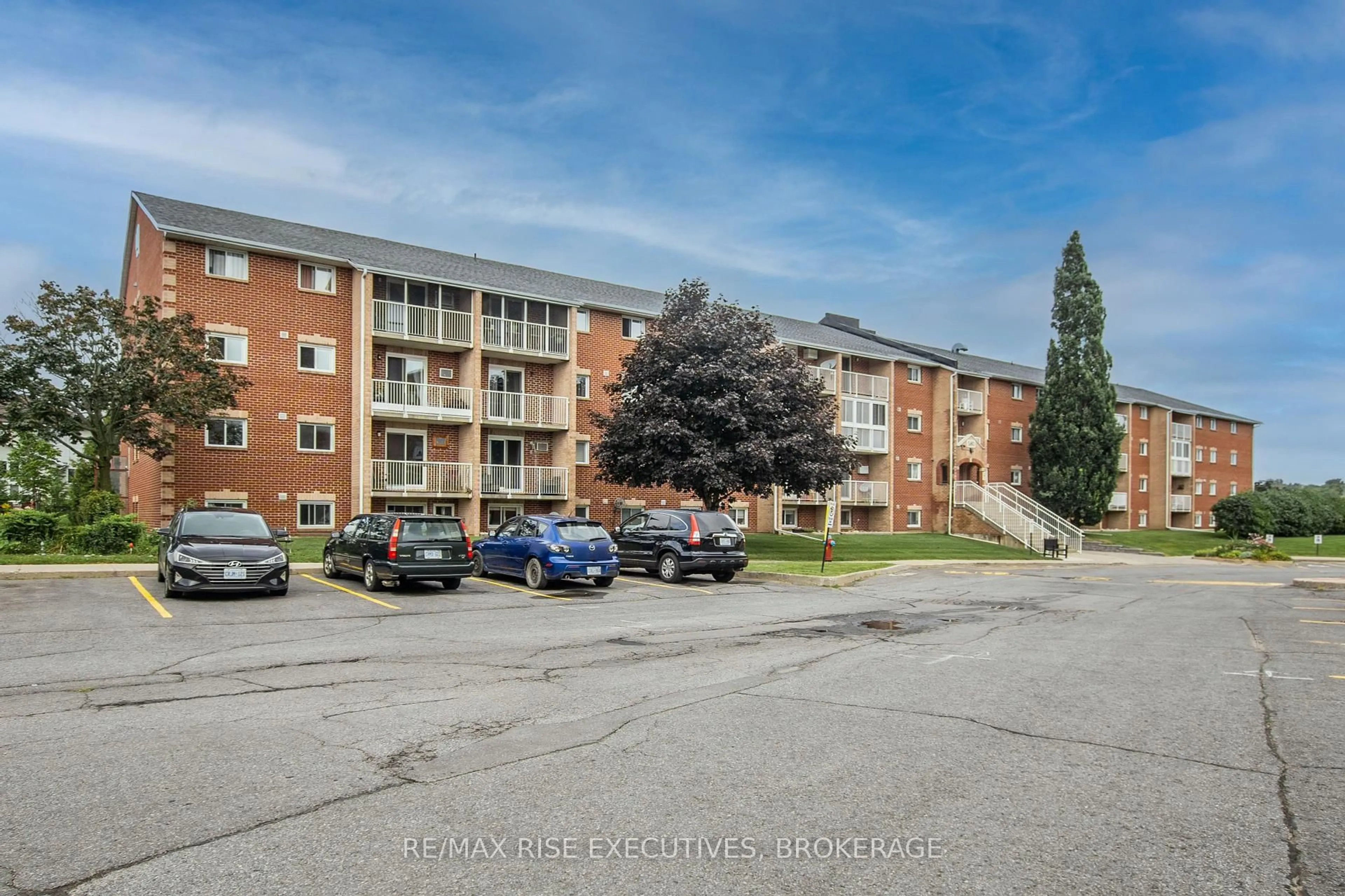A pic from outside/outdoor area/front of a property/back of a property/a pic from drone, unknown for 580 Armstrong Rd #317, Kingston Ontario K7M 8M3