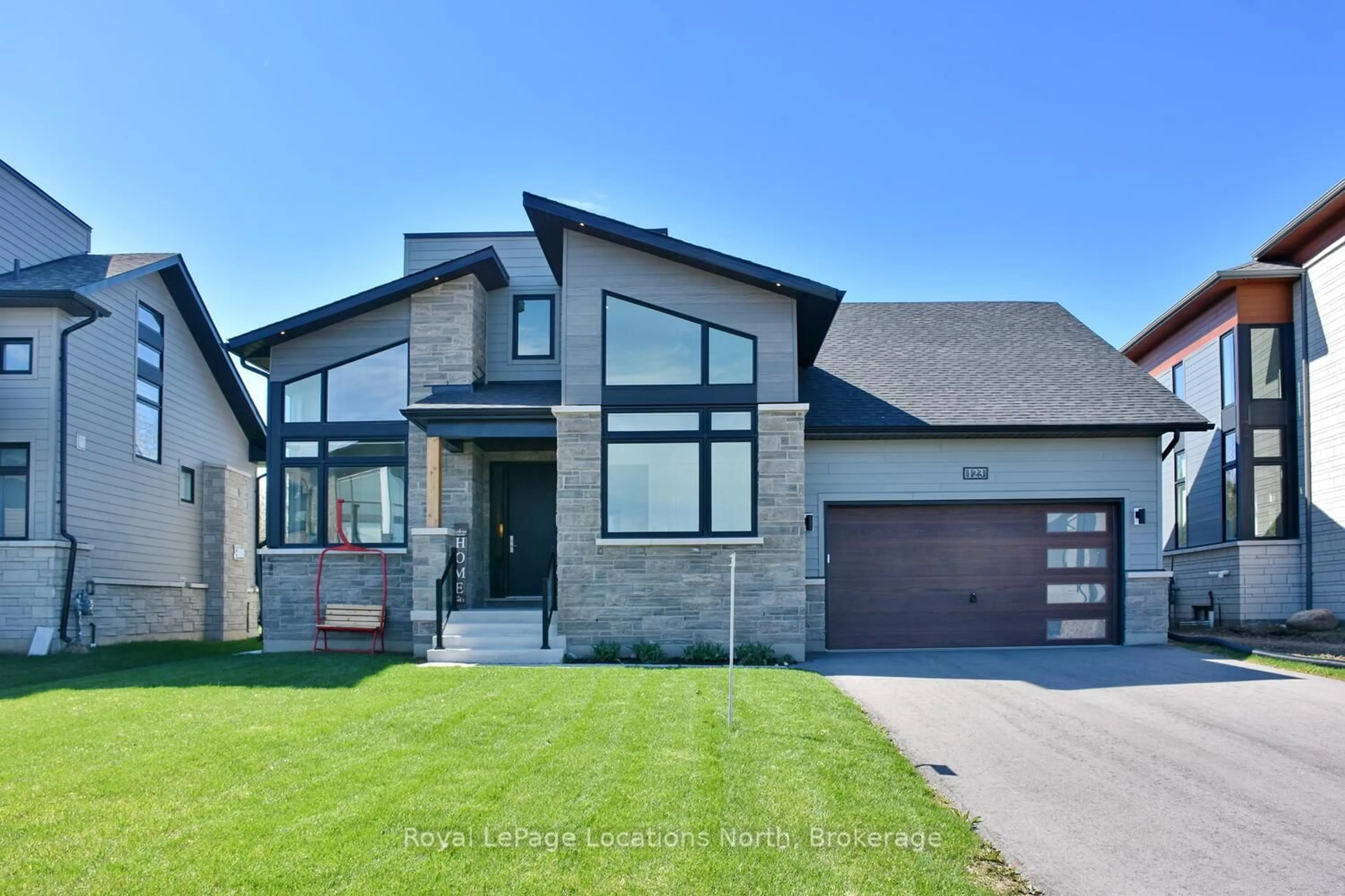Home with brick exterior material, street for 123 Stoneleigh Dr, Blue Mountains Ontario L9Y 4X5
