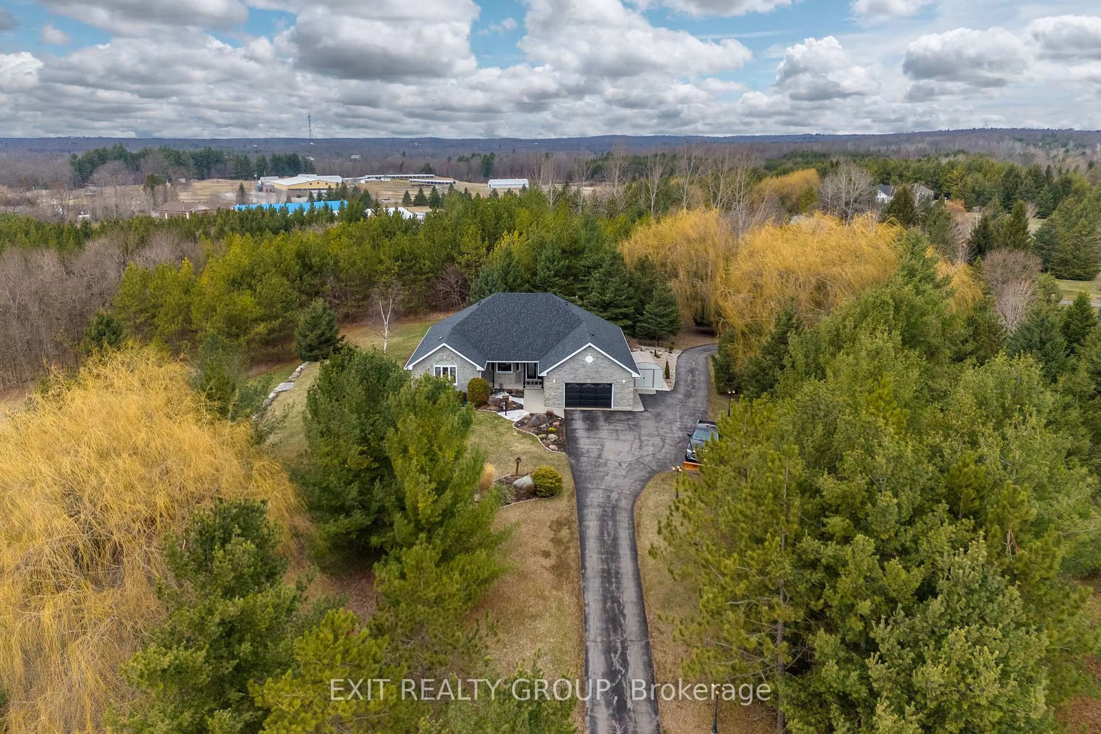 A pic from outside/outdoor area/front of a property/back of a property/a pic from drone, water/lake/river/ocean view for 39 Woods Rd, Madoc Ontario K0K 2K0