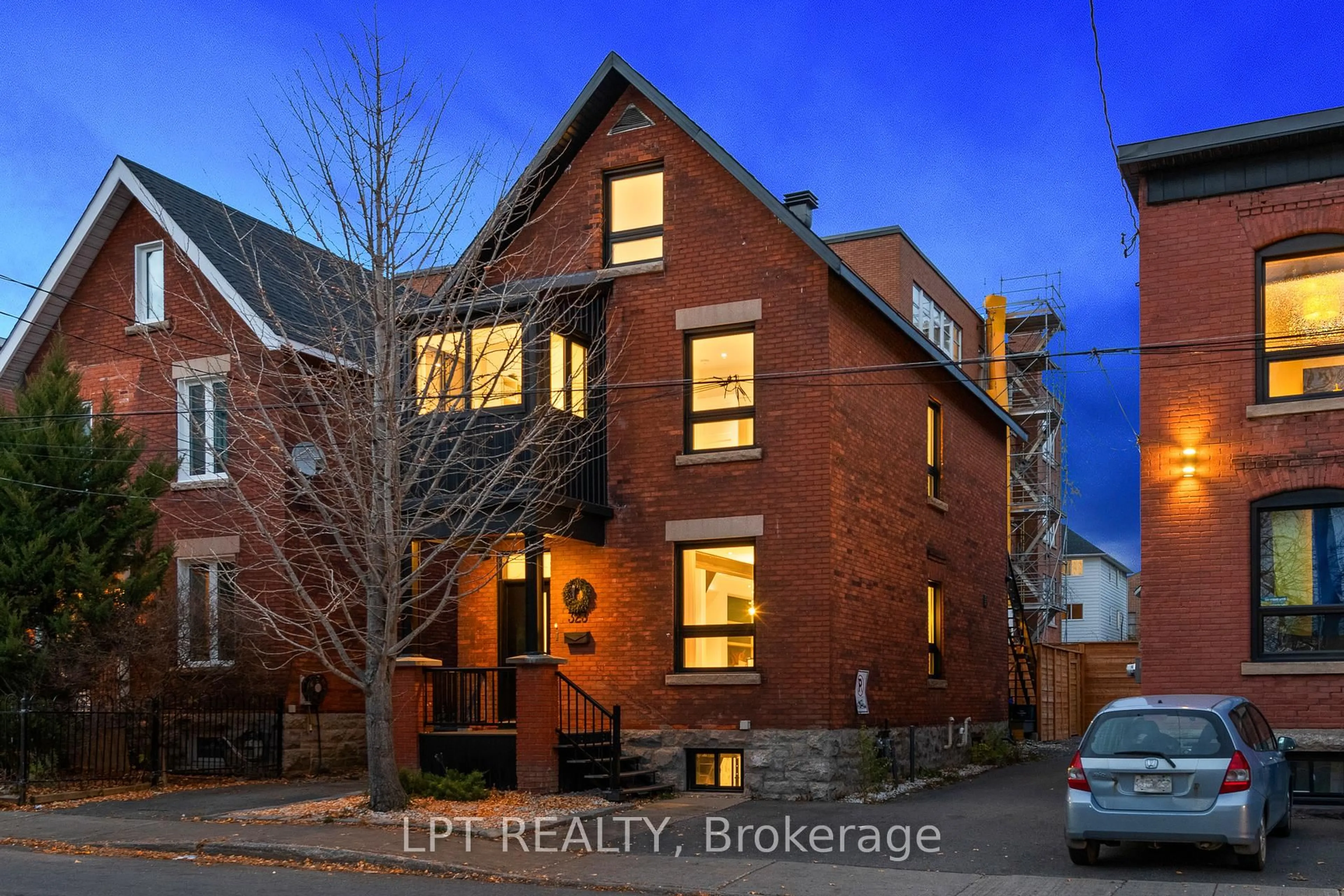 Home with brick exterior material, street for 323 Booth St, Ottawa Ontario K1R 7K1