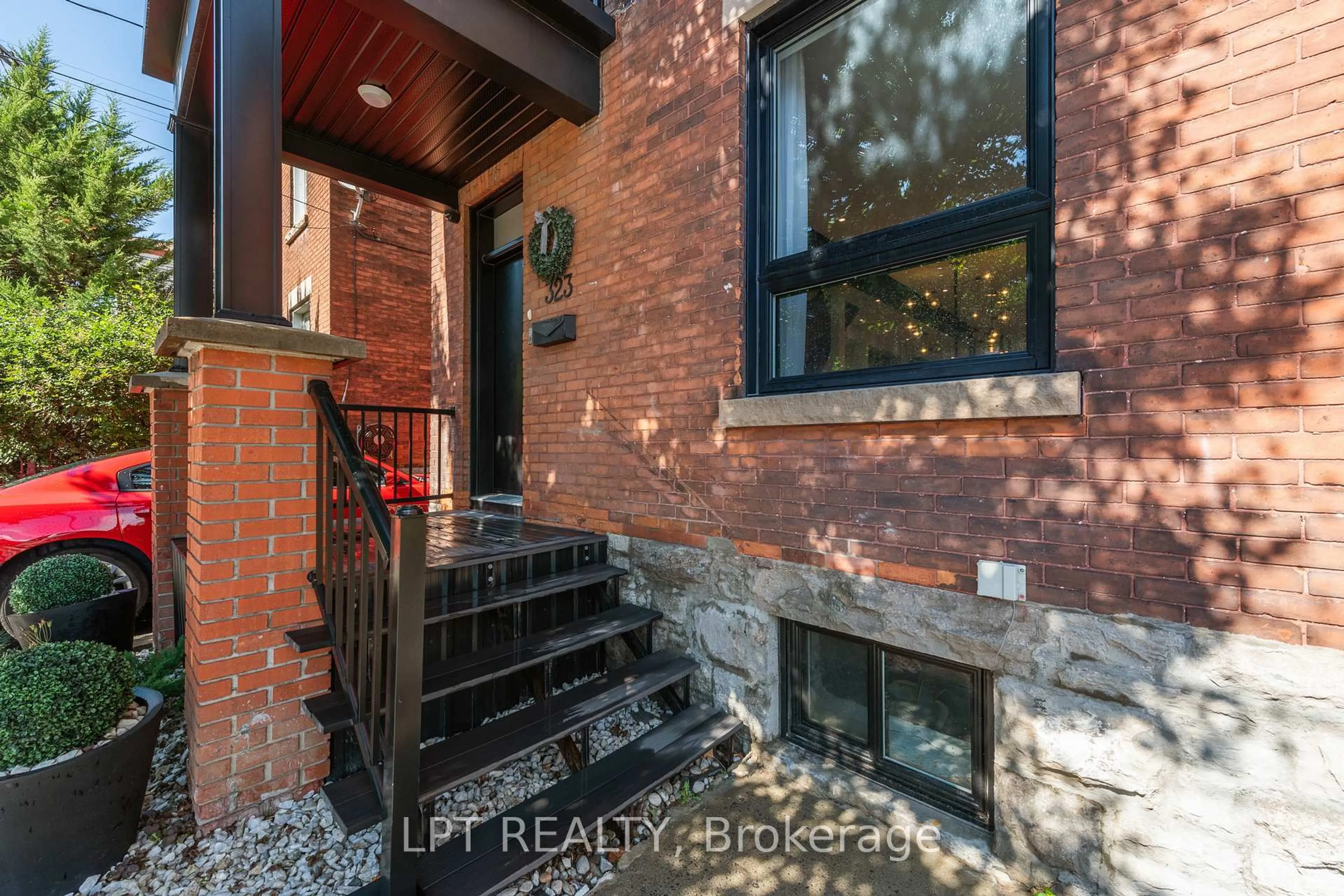 Home with brick exterior material, street for 323 Booth St, Ottawa Ontario K1R 7K1