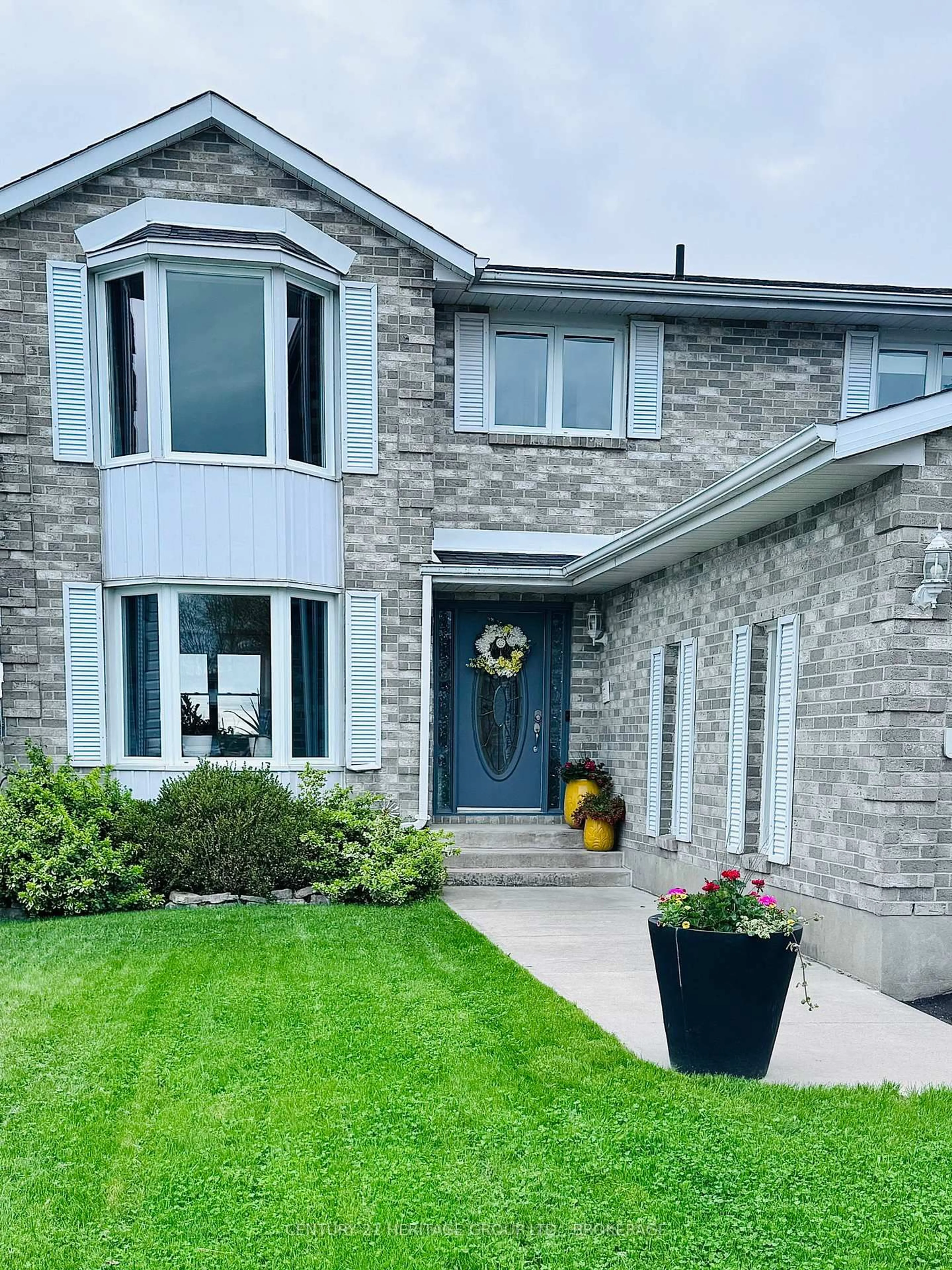 Home with brick exterior material, street for 66 Angus Dr, Greater Napanee Ontario K7R 3W9