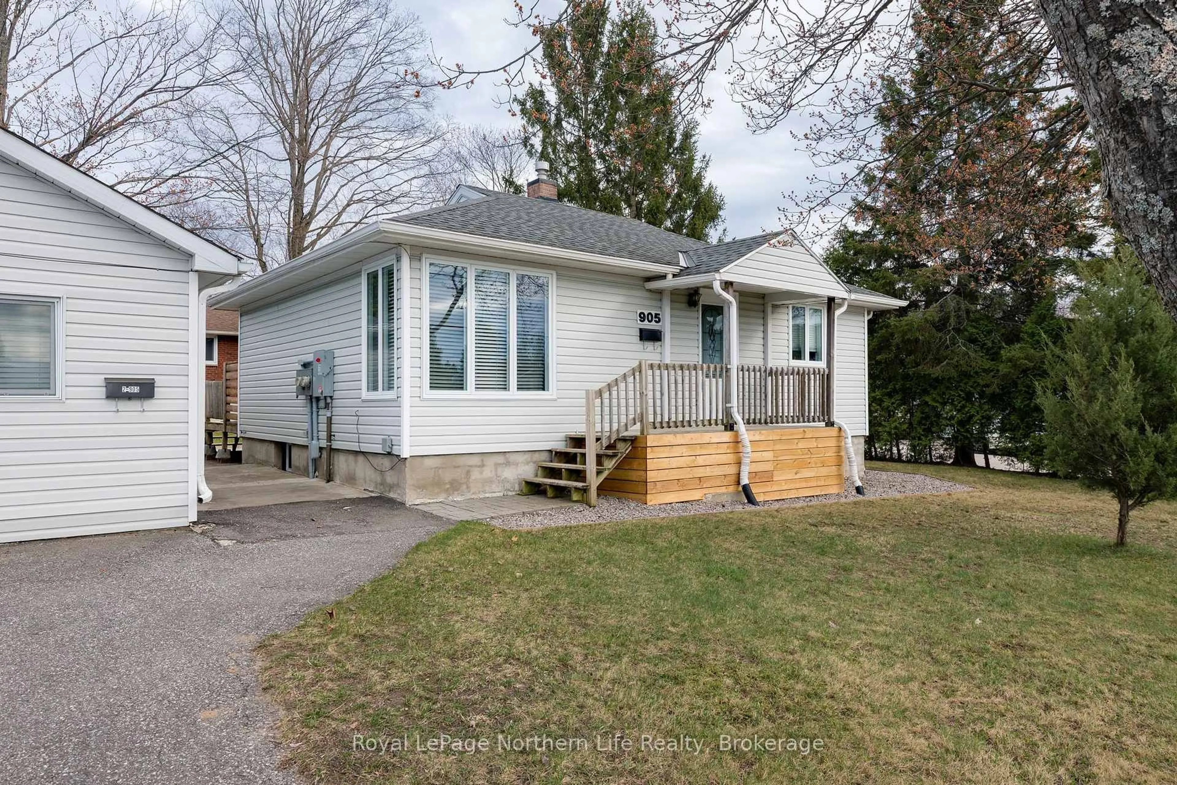 Home with vinyl exterior material, street for 905 Airport Rd, North Bay Ontario P1C 1A5