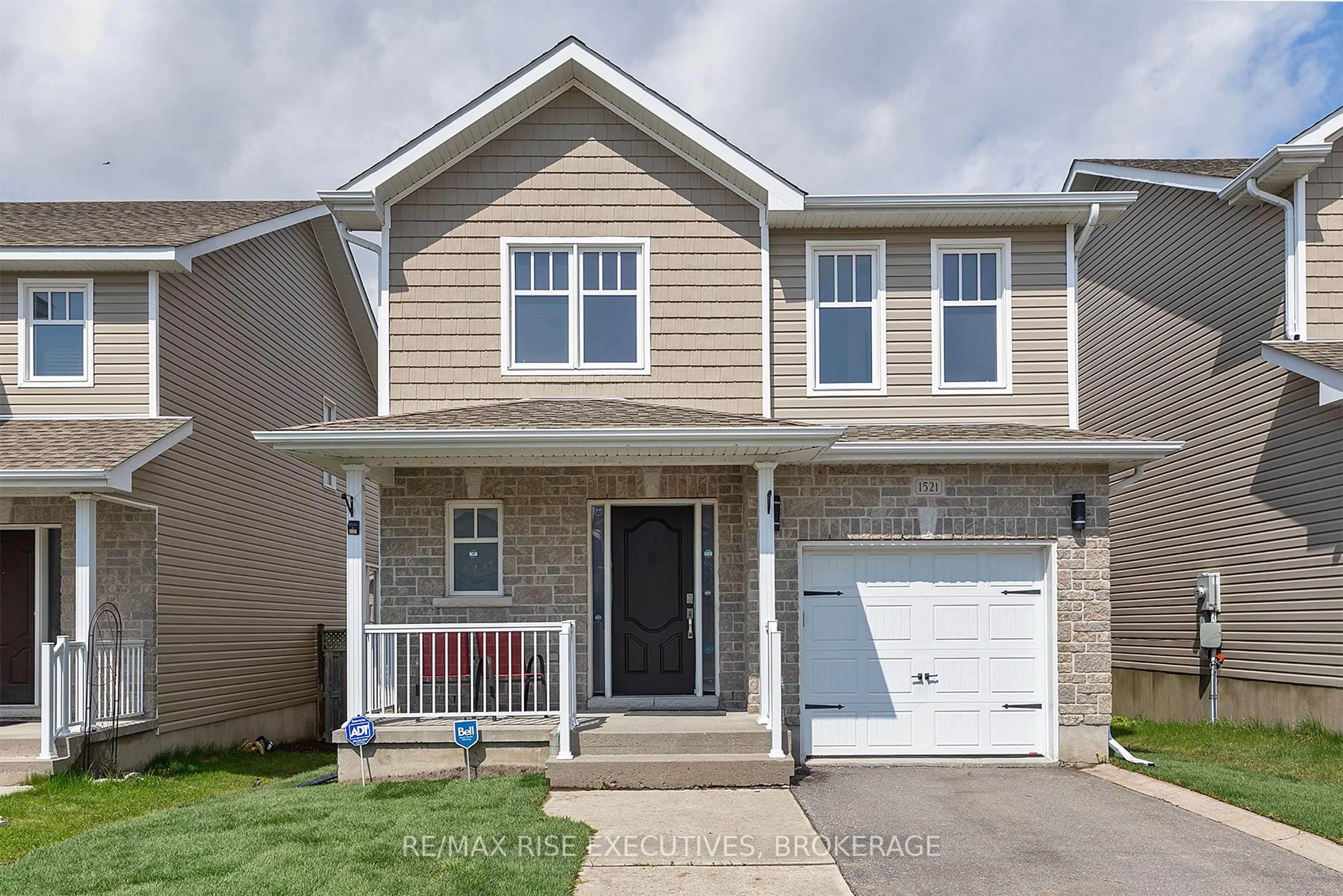 Home with vinyl exterior material, street for 1521 Crimson Cres, Kingston Ontario K7P 0H4