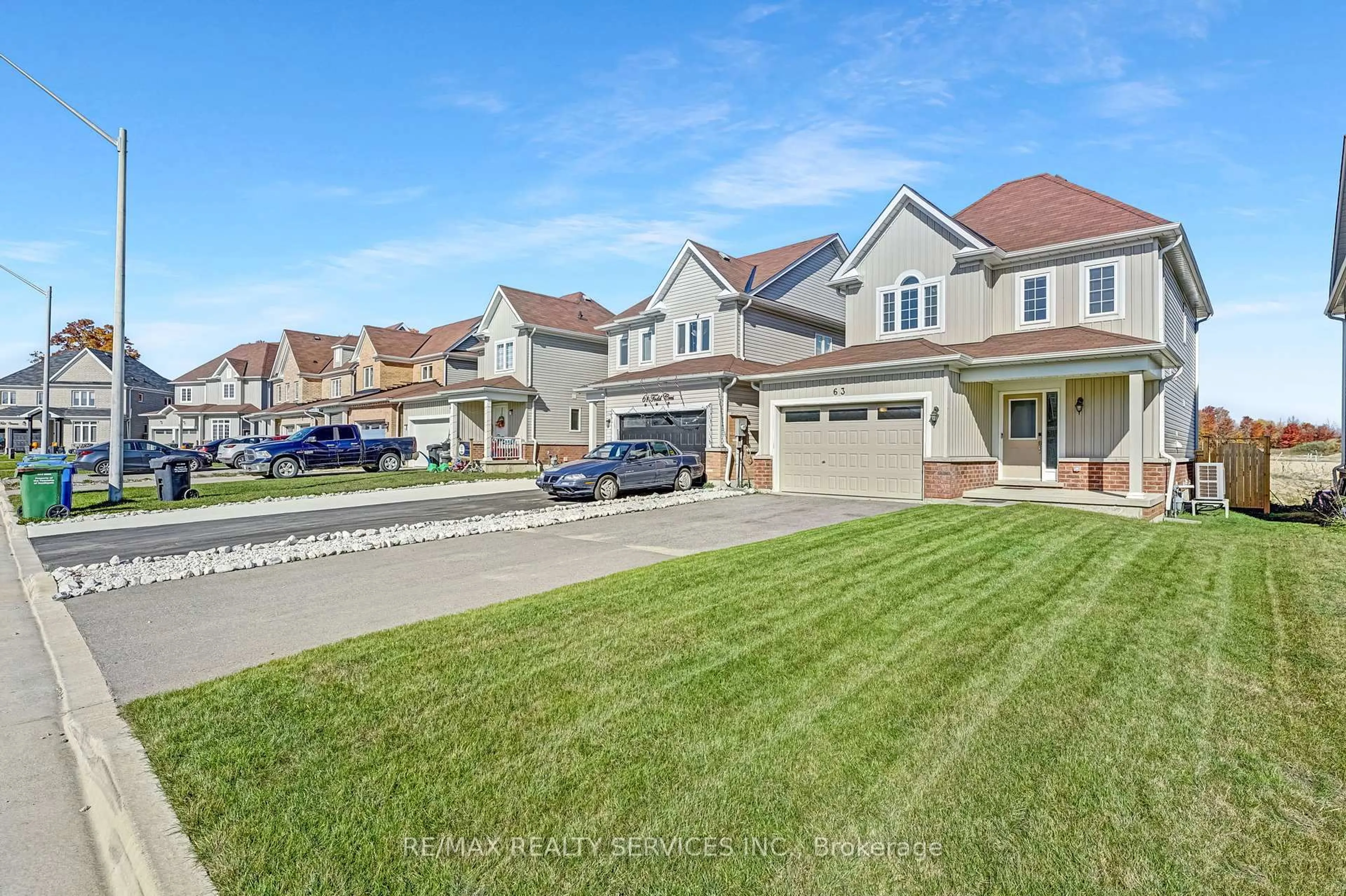 A pic from outside/outdoor area/front of a property/back of a property/a pic from drone, street for 63 Todd Cres, Southgate Ontario N0C 1B0
