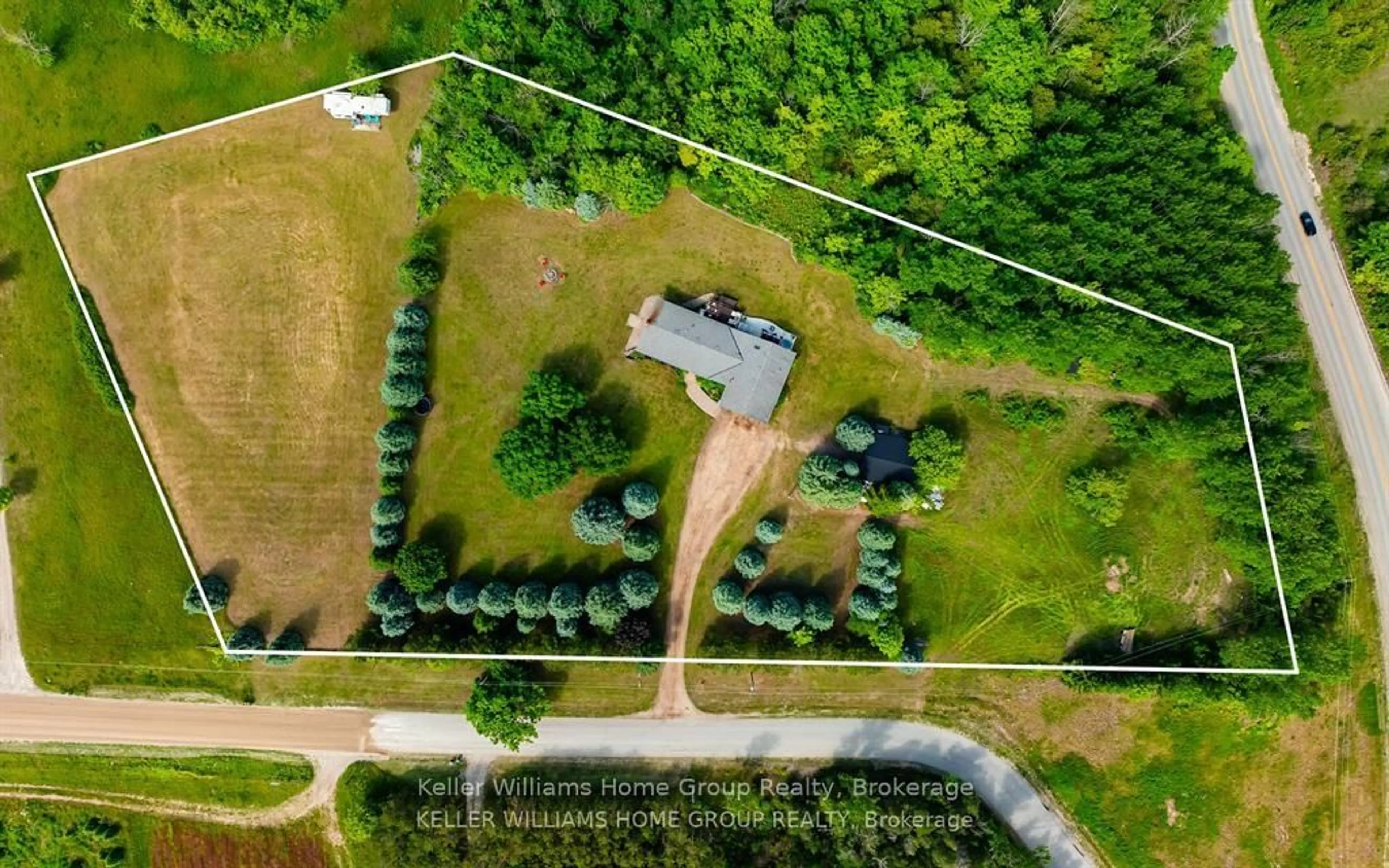 A pic from outside/outdoor area/front of a property/back of a property/a pic from drone, unknown for 996594 Mulmur Tos Townline N/A, Mulmur Ontario L9V 0N2