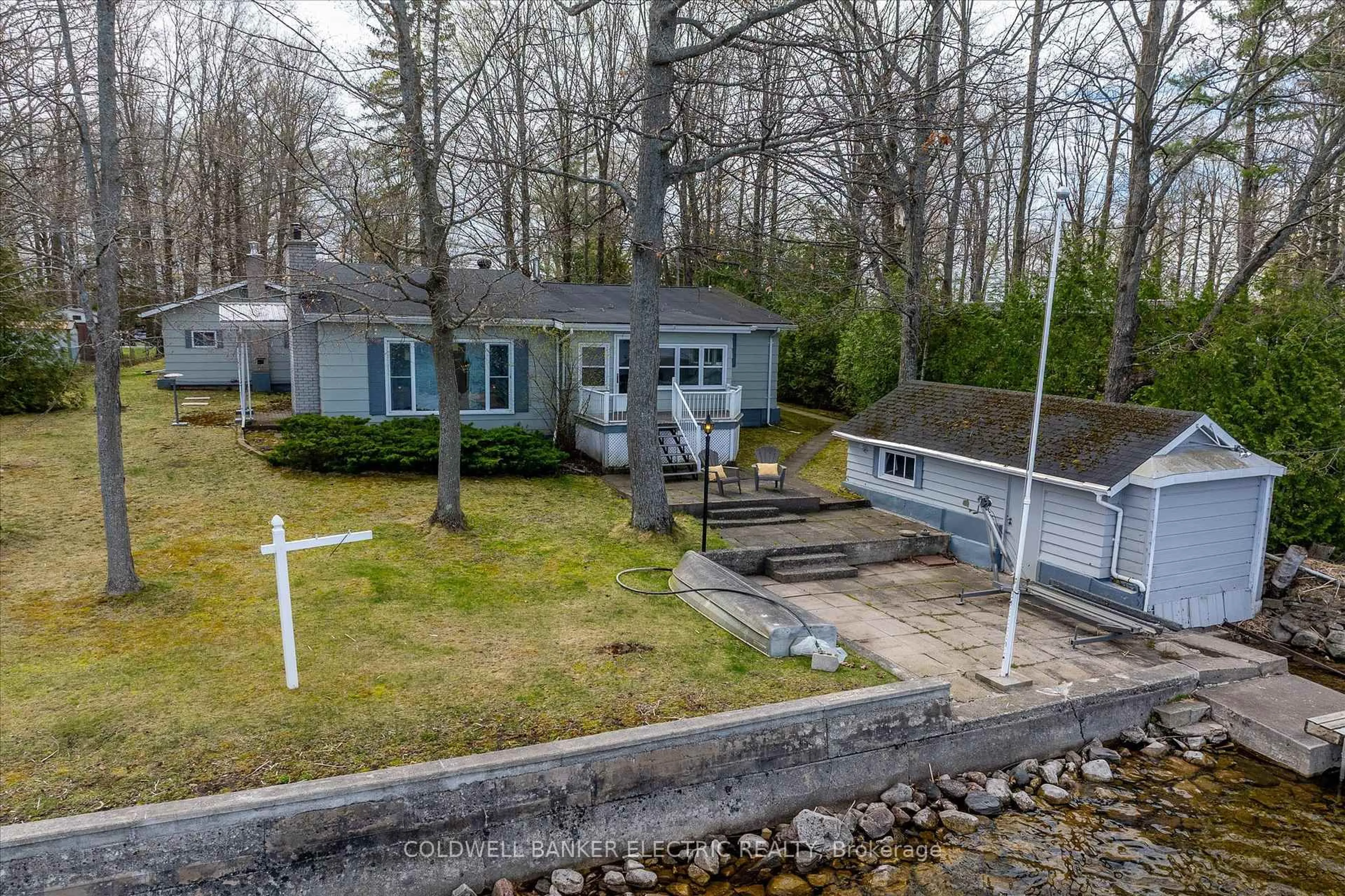 A pic from outside/outdoor area/front of a property/back of a property/a pic from drone, water/lake/river/ocean view for 318 Fothergill Isle N/A, Selwyn Ontario K9J 6X2