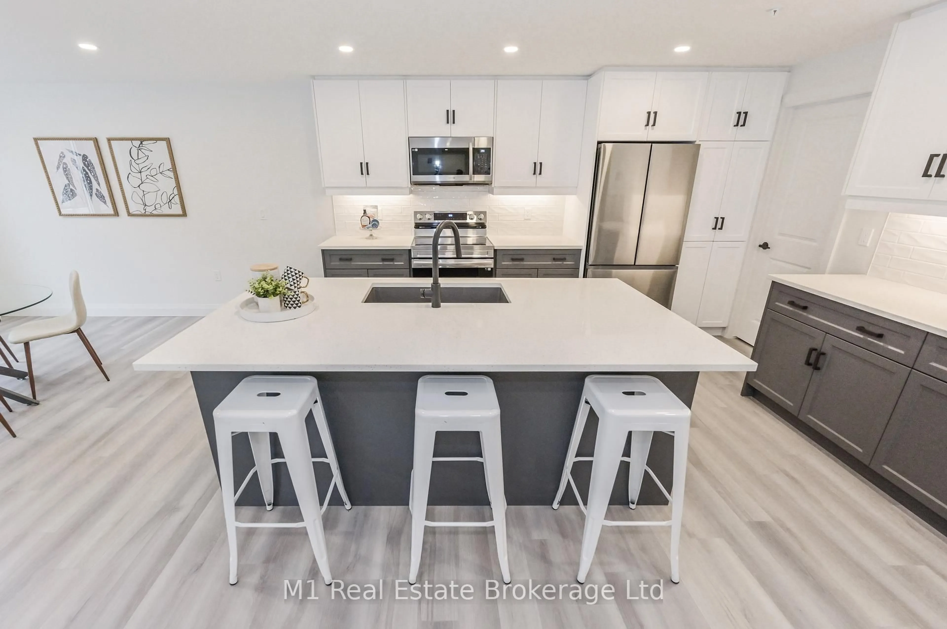 Open concept kitchen, ceramic/tile floor for 99B Farley Rd #104, Centre Wellington Ontario N1M 0K5