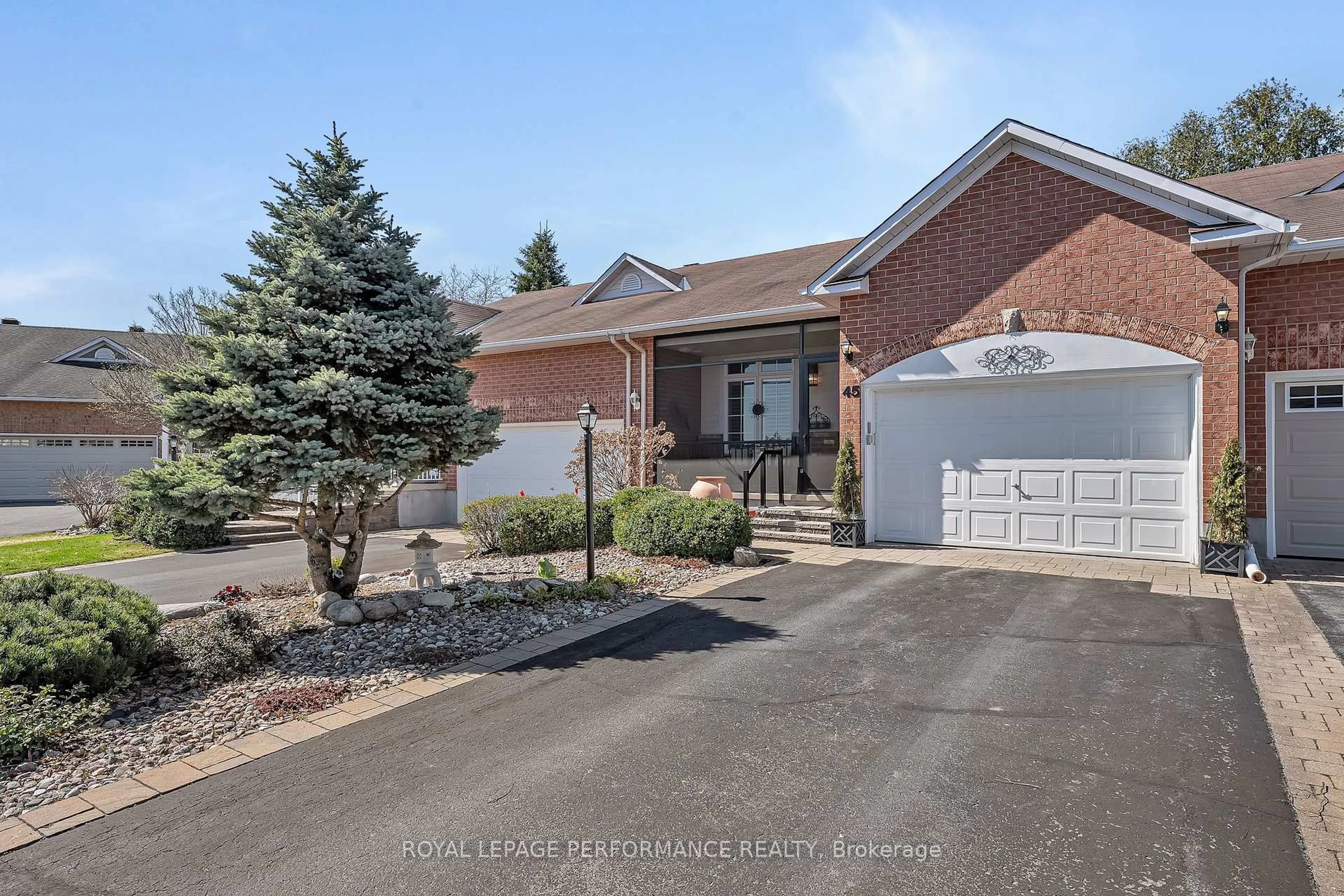 Home with brick exterior material, street for 45 Sable Run Dr, Stittsville Ontario K2S 1W8