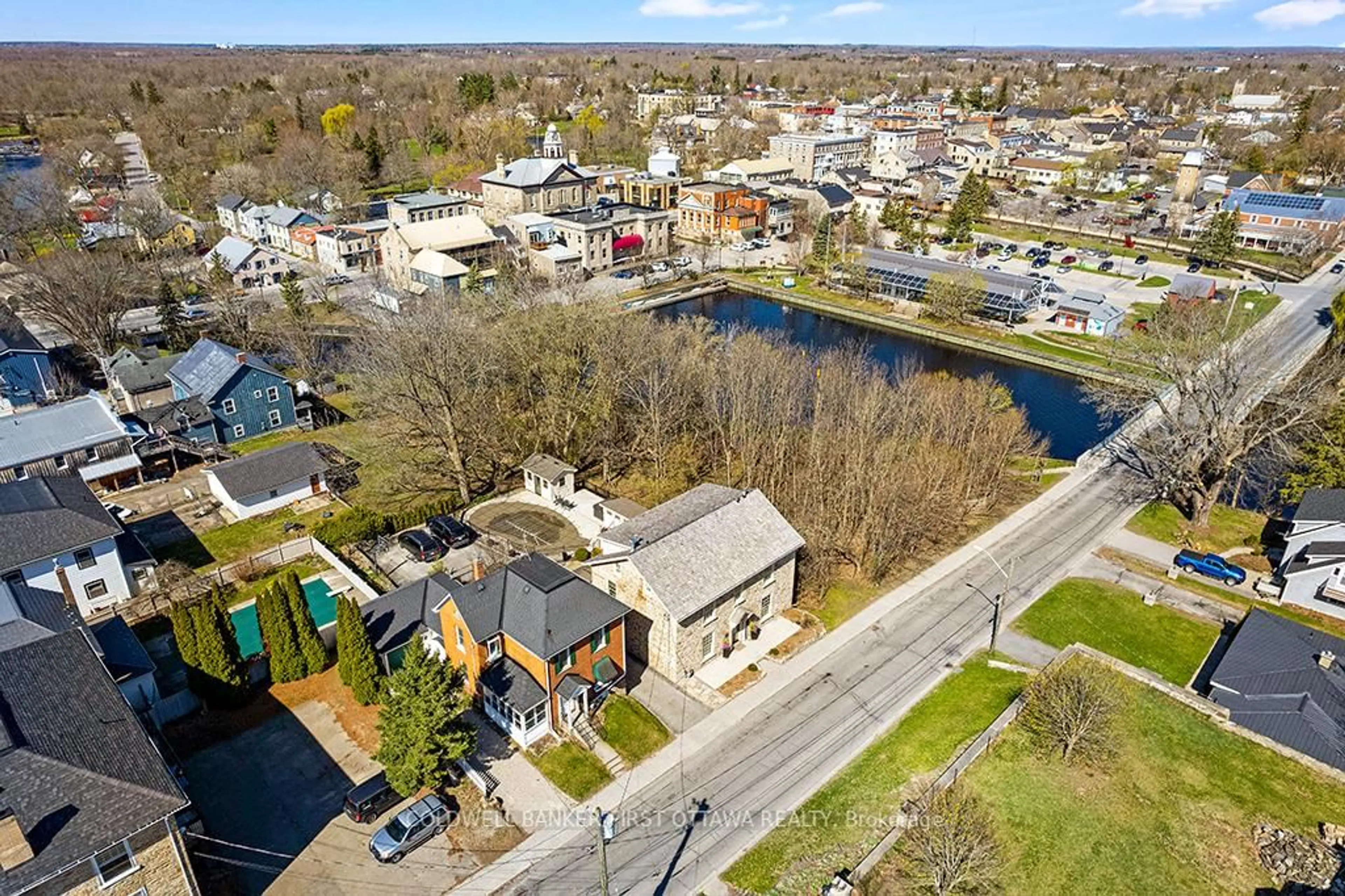 A pic from outside/outdoor area/front of a property/back of a property/a pic from drone, water/lake/river/ocean view for 32 Drummond St, Perth Ontario K7H 1E9