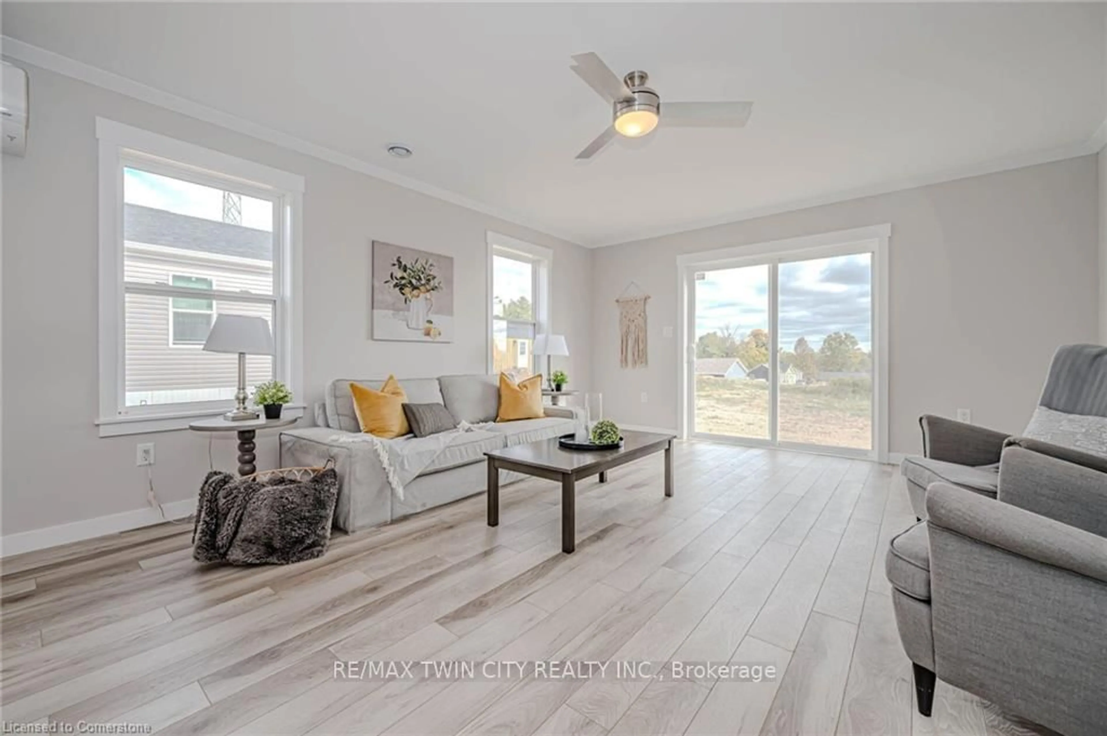 Living room with furniture, wood/laminate floor for 1085 Concession 10 Rd #Lot R, Hamilton Ontario L0R 1K0