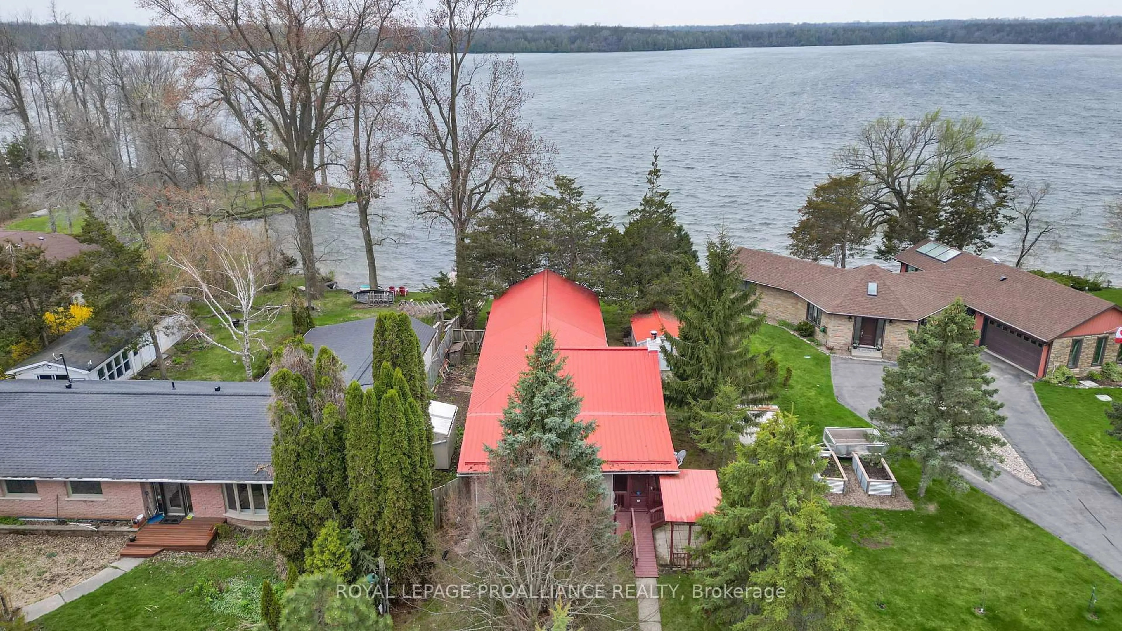 A pic from outside/outdoor area/front of a property/back of a property/a pic from drone, water/lake/river/ocean view for 340 County Road 7 N/A, Prince Edward County Ontario K0K 2T0
