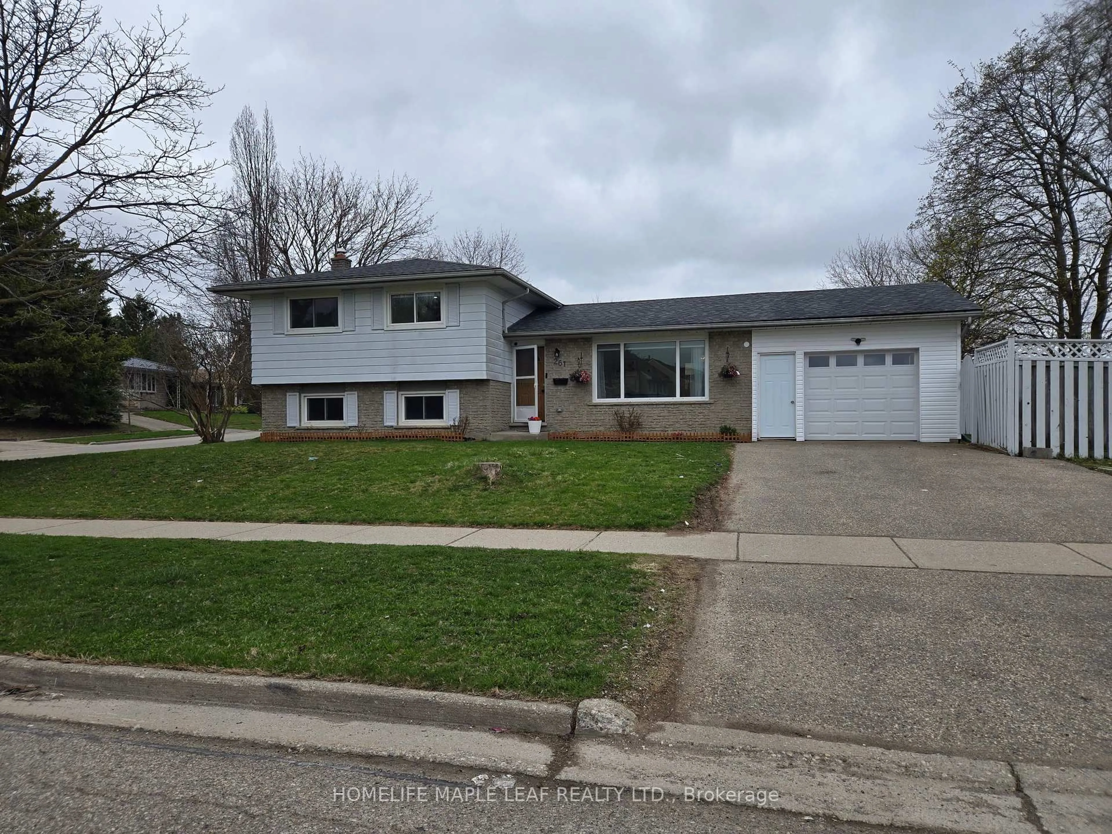 Home with vinyl exterior material, street for 261 Overlea Dr, Kitchener Ontario N2M 1T7