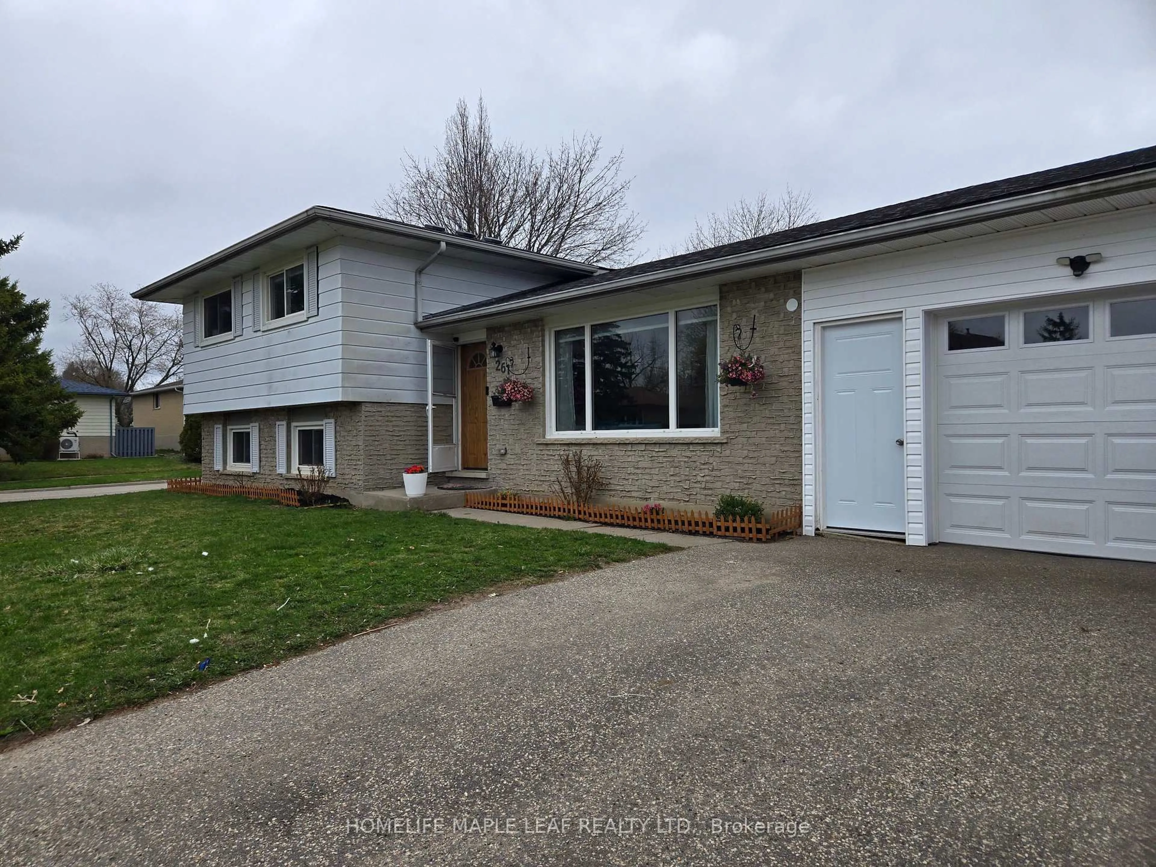 Home with vinyl exterior material, street for 261 Overlea Dr, Kitchener Ontario N2M 1T7