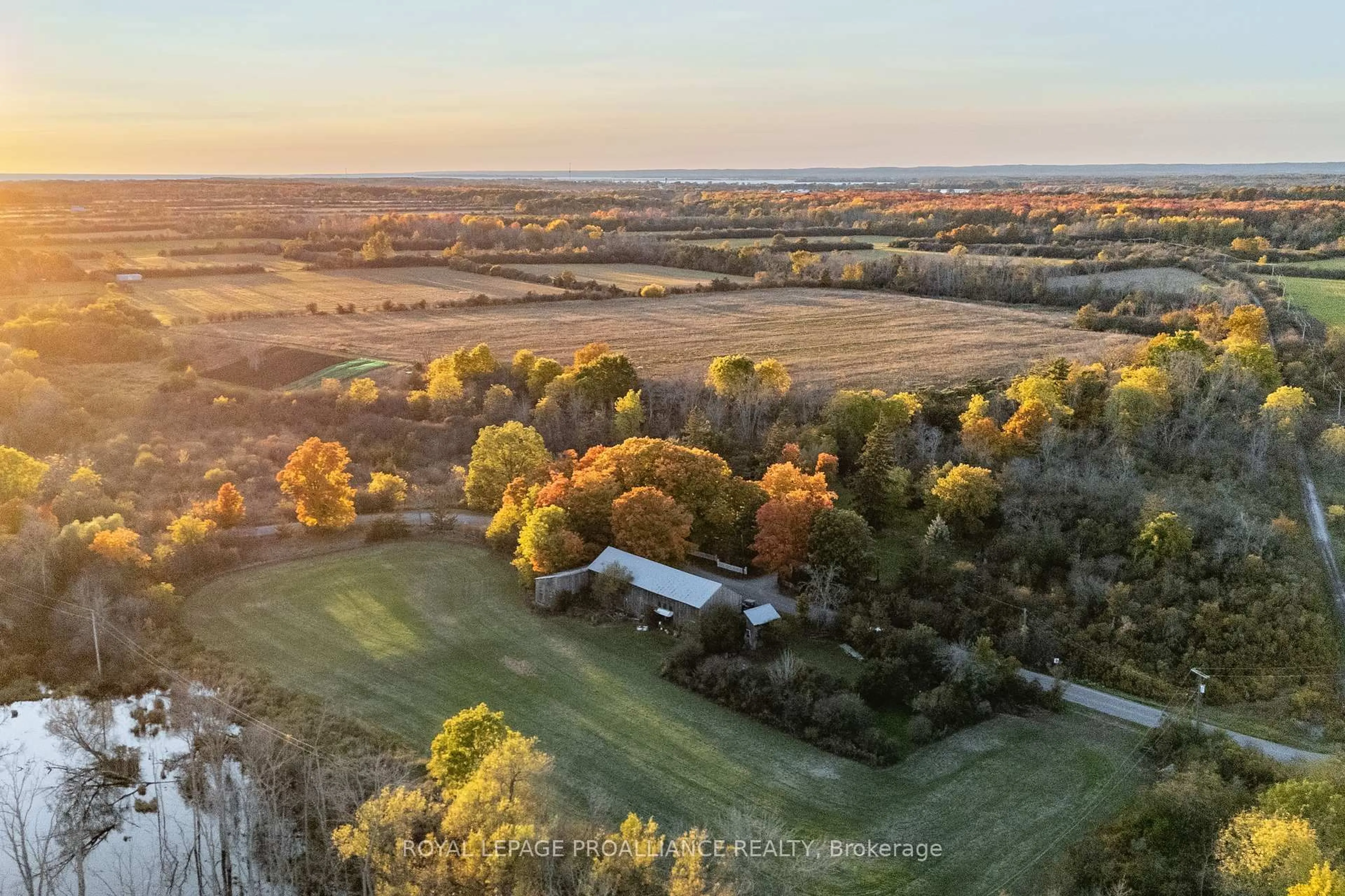 A pic from outside/outdoor area/front of a property/back of a property/a pic from drone, forest/trees view for 141&142 Station Rd, Prince Edward County Ontario K0K 2J0