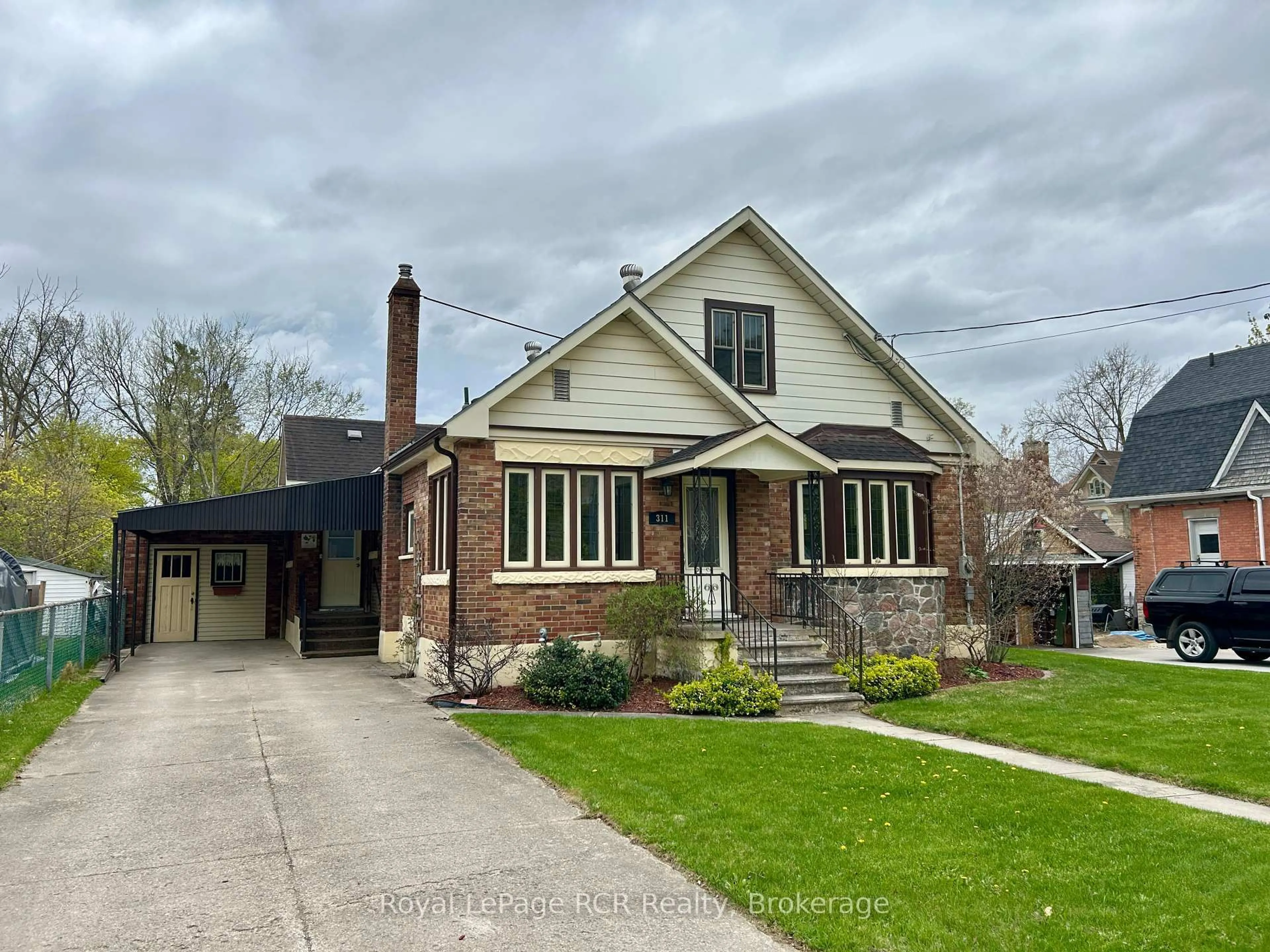 Home with brick exterior material, street for 311 12th St, Hanover Ontario N4N 1V5