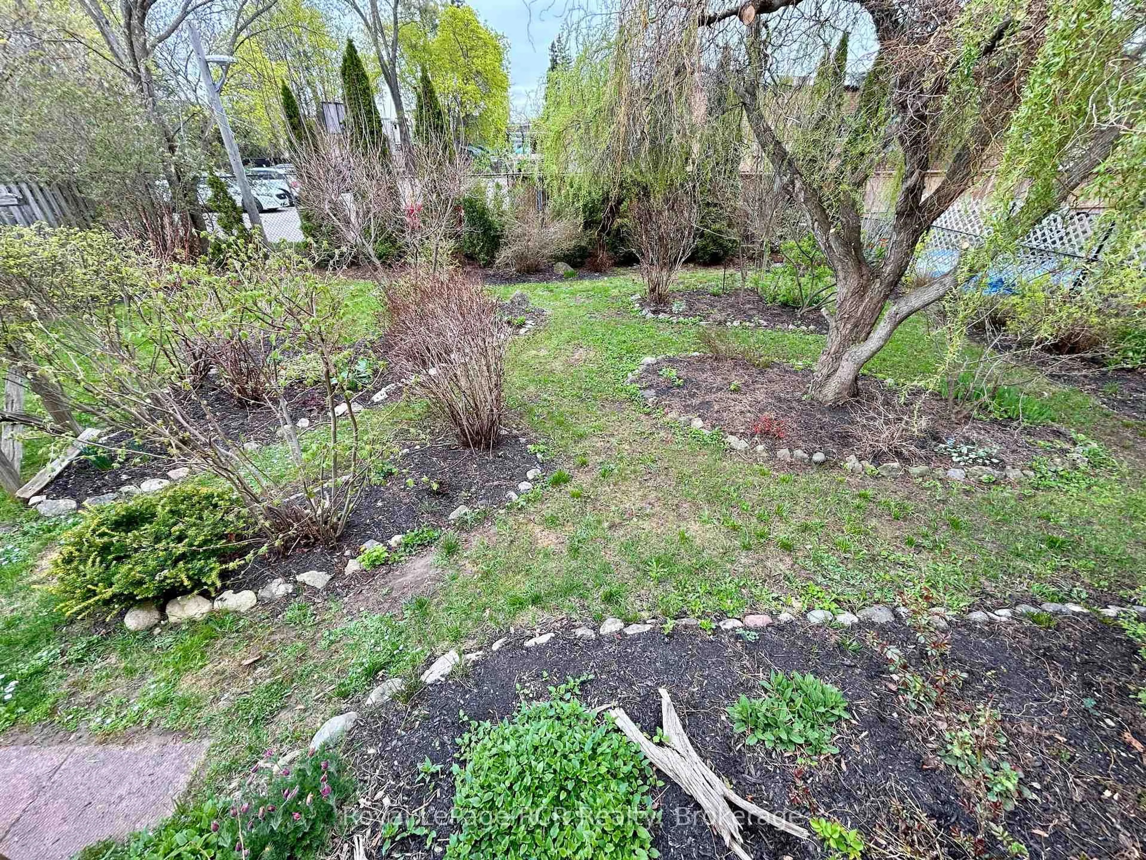 A pic from outside/outdoor area/front of a property/back of a property/a pic from drone, forest/trees view for 311 12th St, Hanover Ontario N4N 1V5