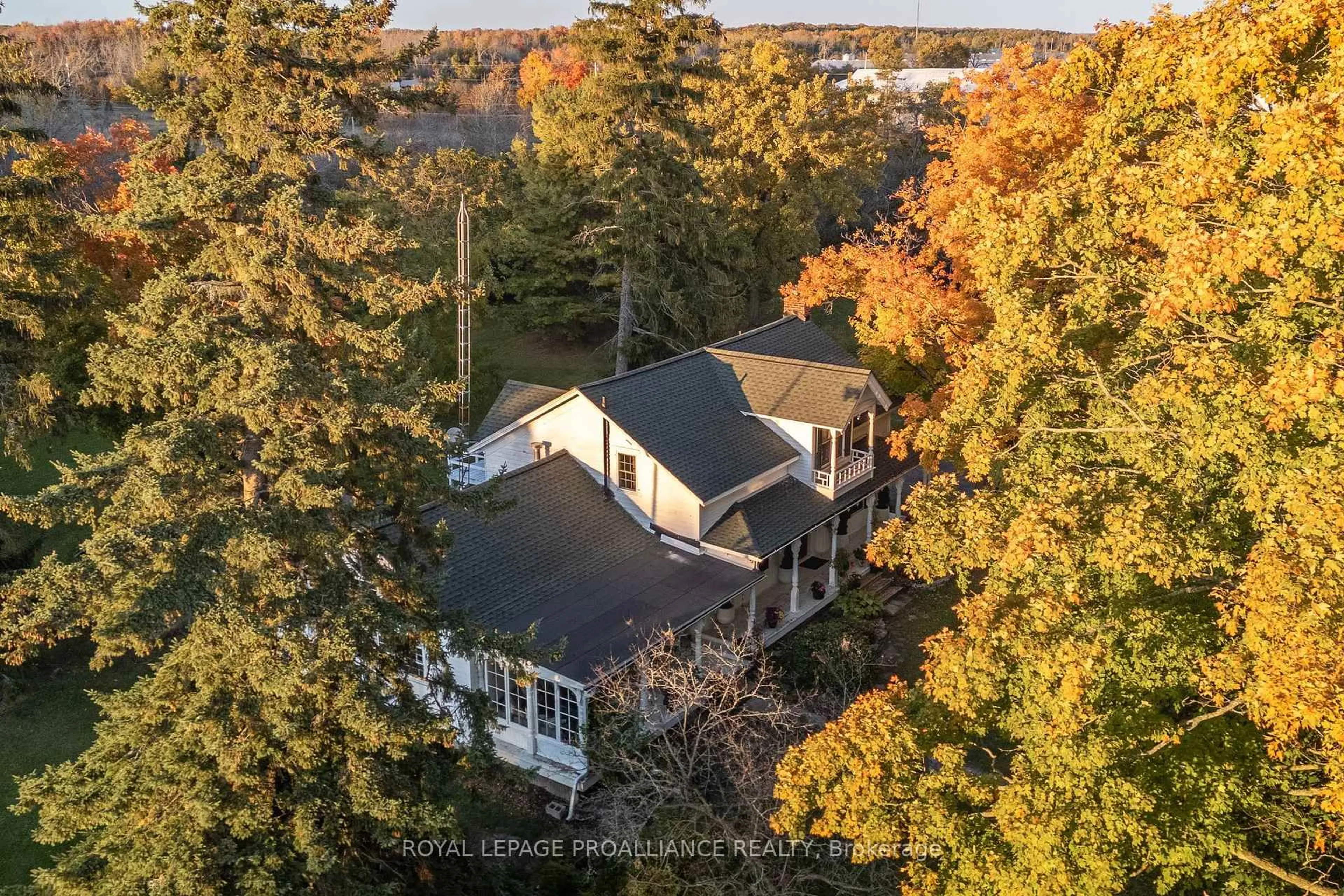 A pic from outside/outdoor area/front of a property/back of a property/a pic from drone, forest/trees view for 141 Station Rd, Prince Edward County Ontario K0K 2J0