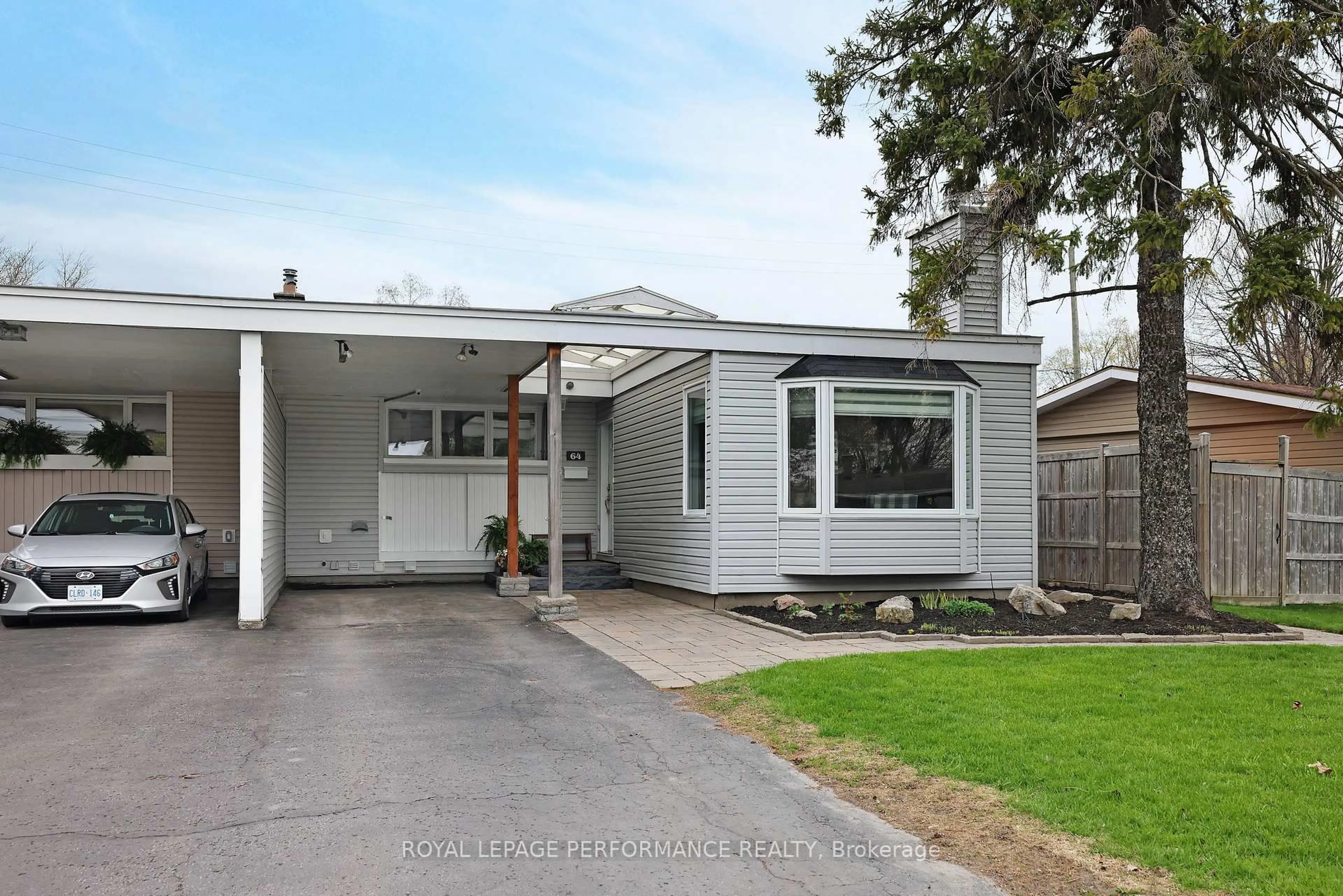 Home with vinyl exterior material, street for 64 Crystal Beach Dr, Ottawa Ontario K2A 0E8