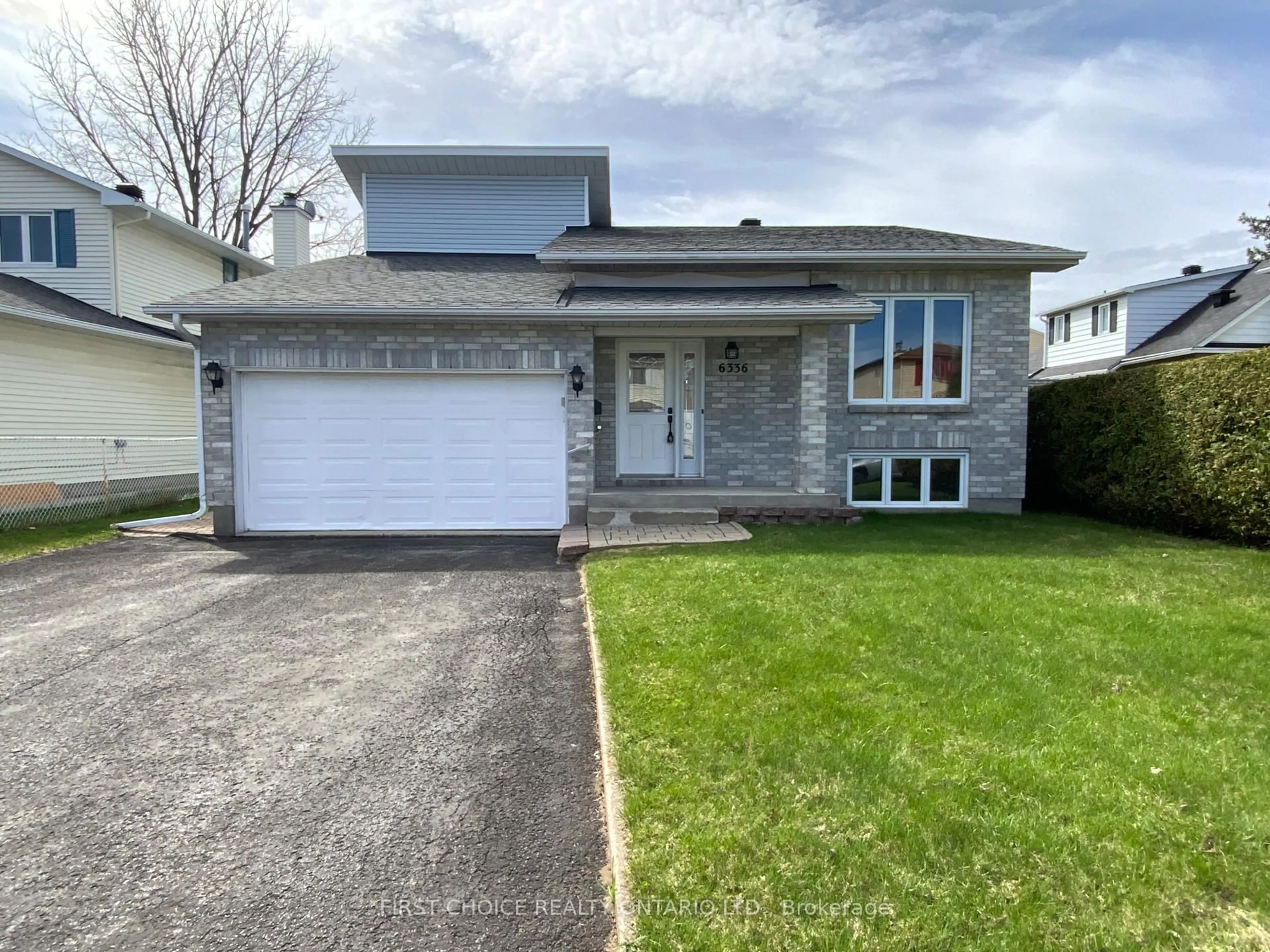 Home with vinyl exterior material, street for 6336 Loire Dr, Ottawa Ontario K1C 3C8