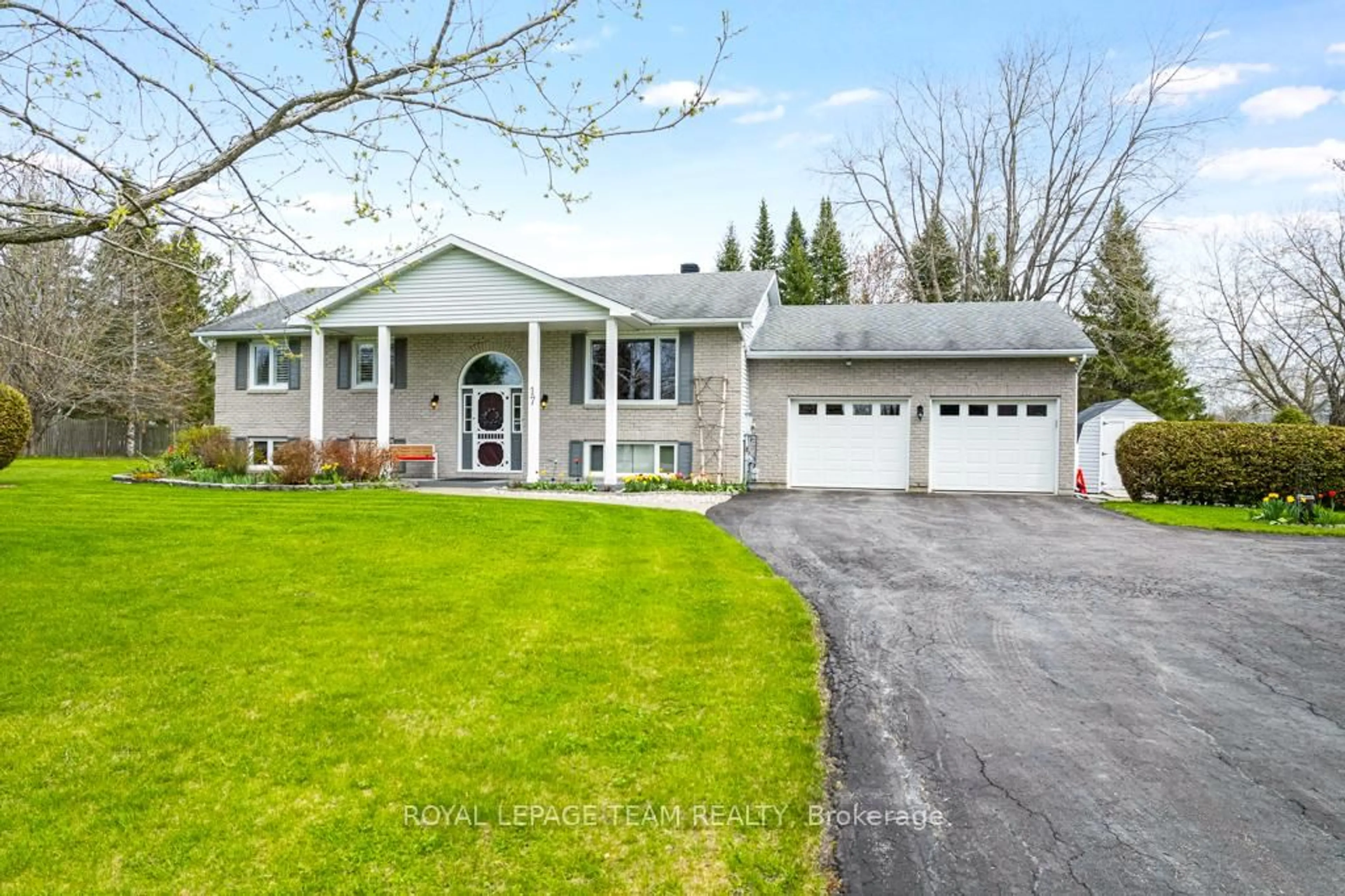 Home with vinyl exterior material, street for 17 Pioneer Dr, North Grenville Ontario K0G 1J0