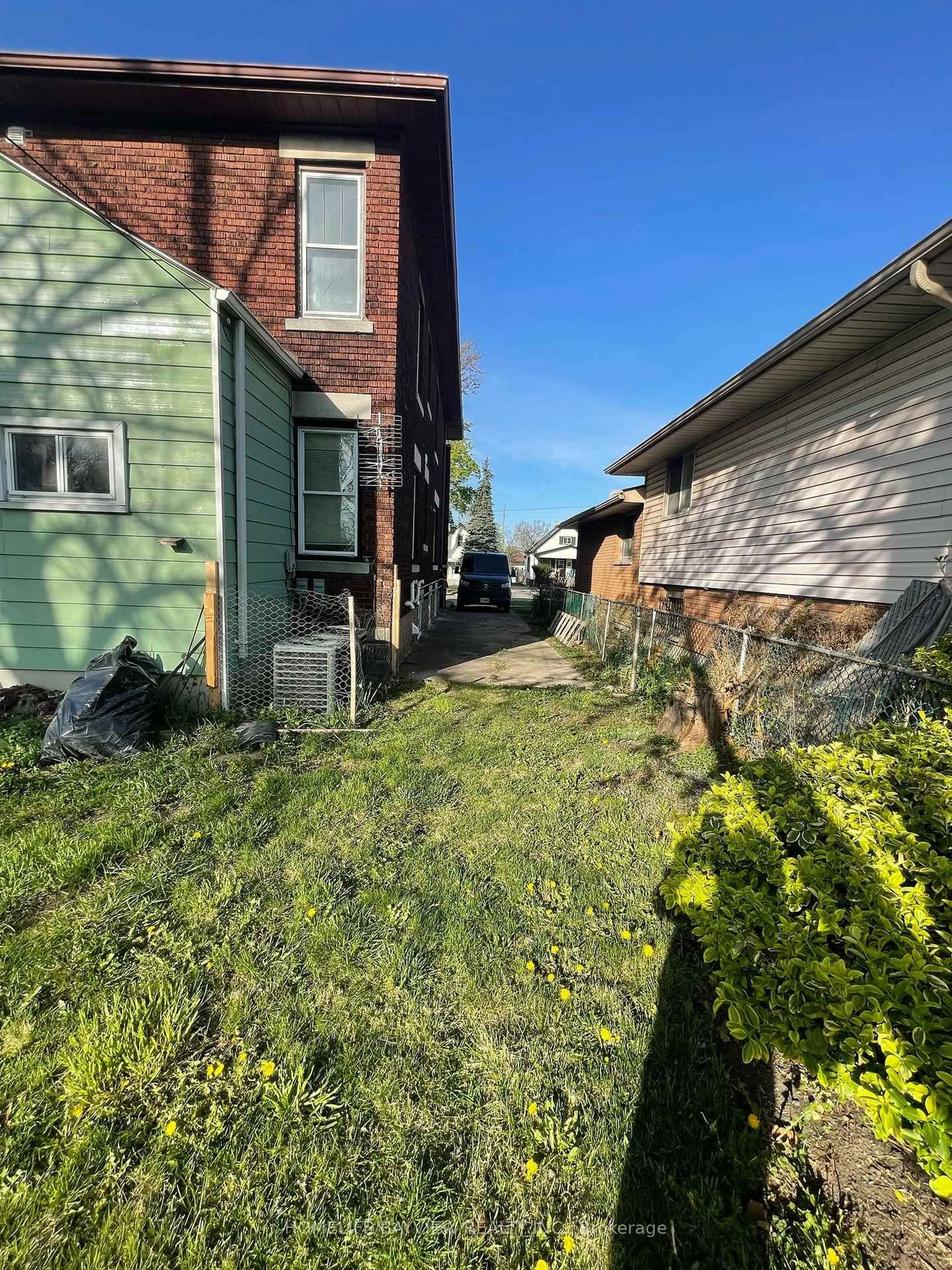 A pic from outside/outdoor area/front of a property/back of a property/a pic from drone, street for 478-480 Cameron Ave, Windsor Ontario N9B 1Y7