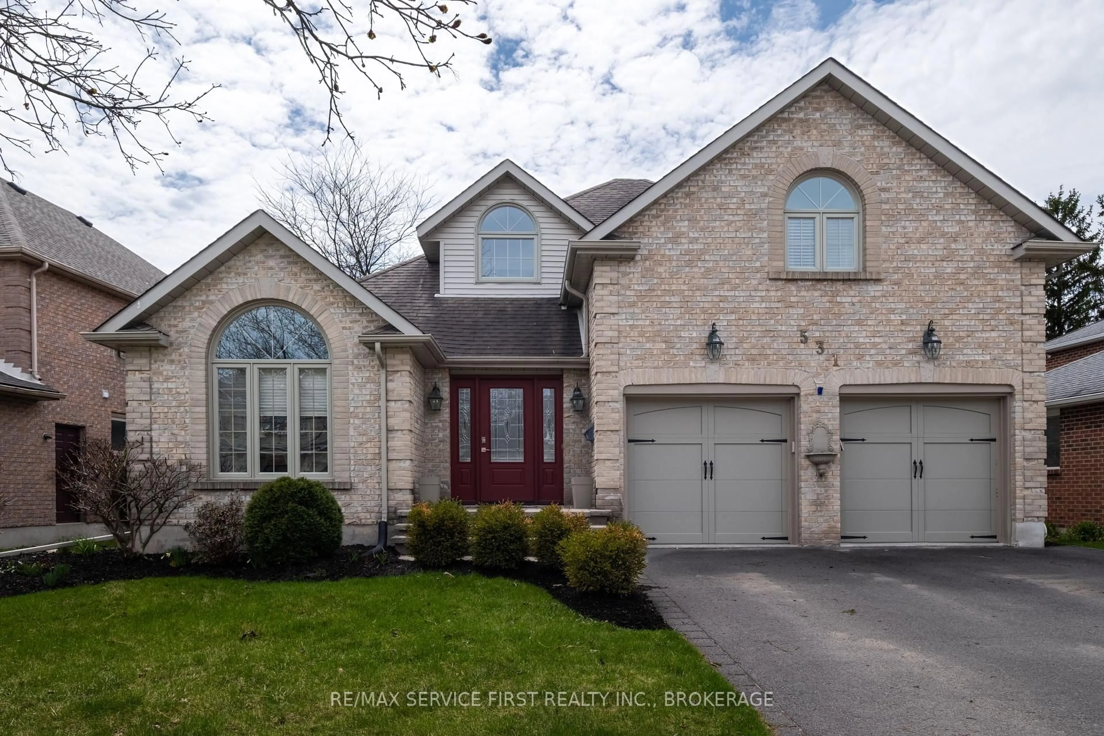 Home with brick exterior material, street for 531 Forest Hill Drive E Dr, Kingston Ontario K7M 8M5