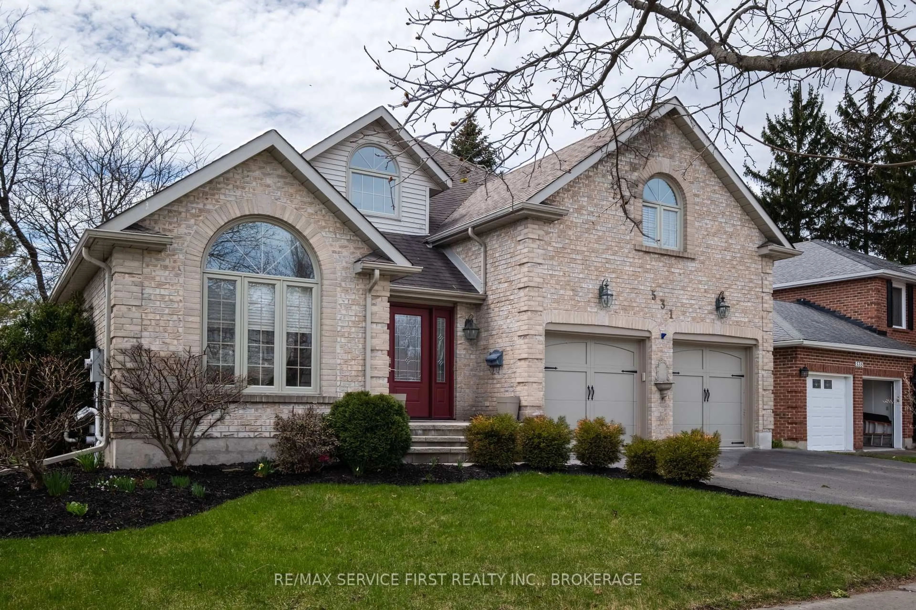 Home with brick exterior material, street for 531 Forest Hill Drive E Dr, Kingston Ontario K7M 8M5