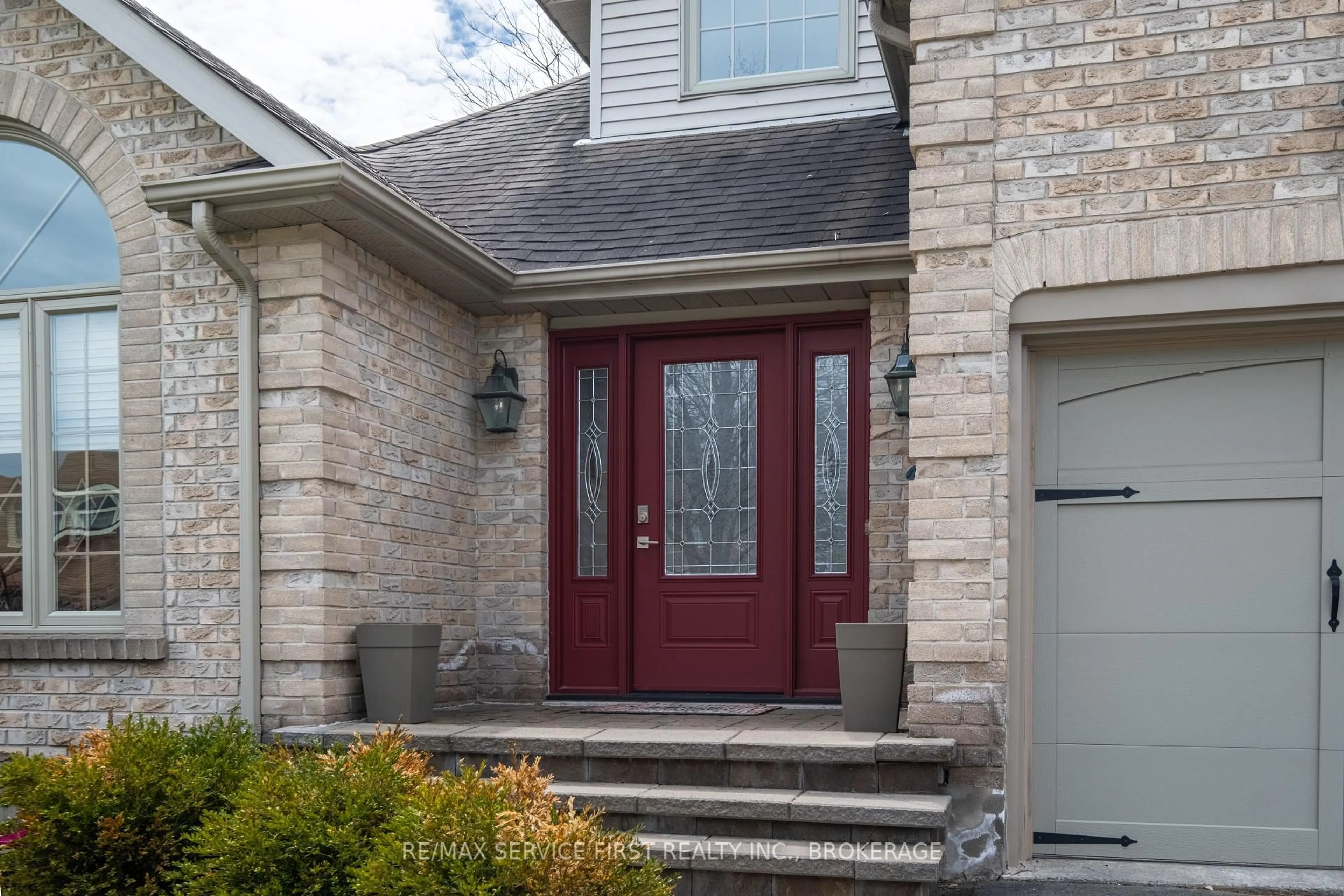 Home with brick exterior material, street for 531 Forest Hill Drive E Dr, Kingston Ontario K7M 8M5