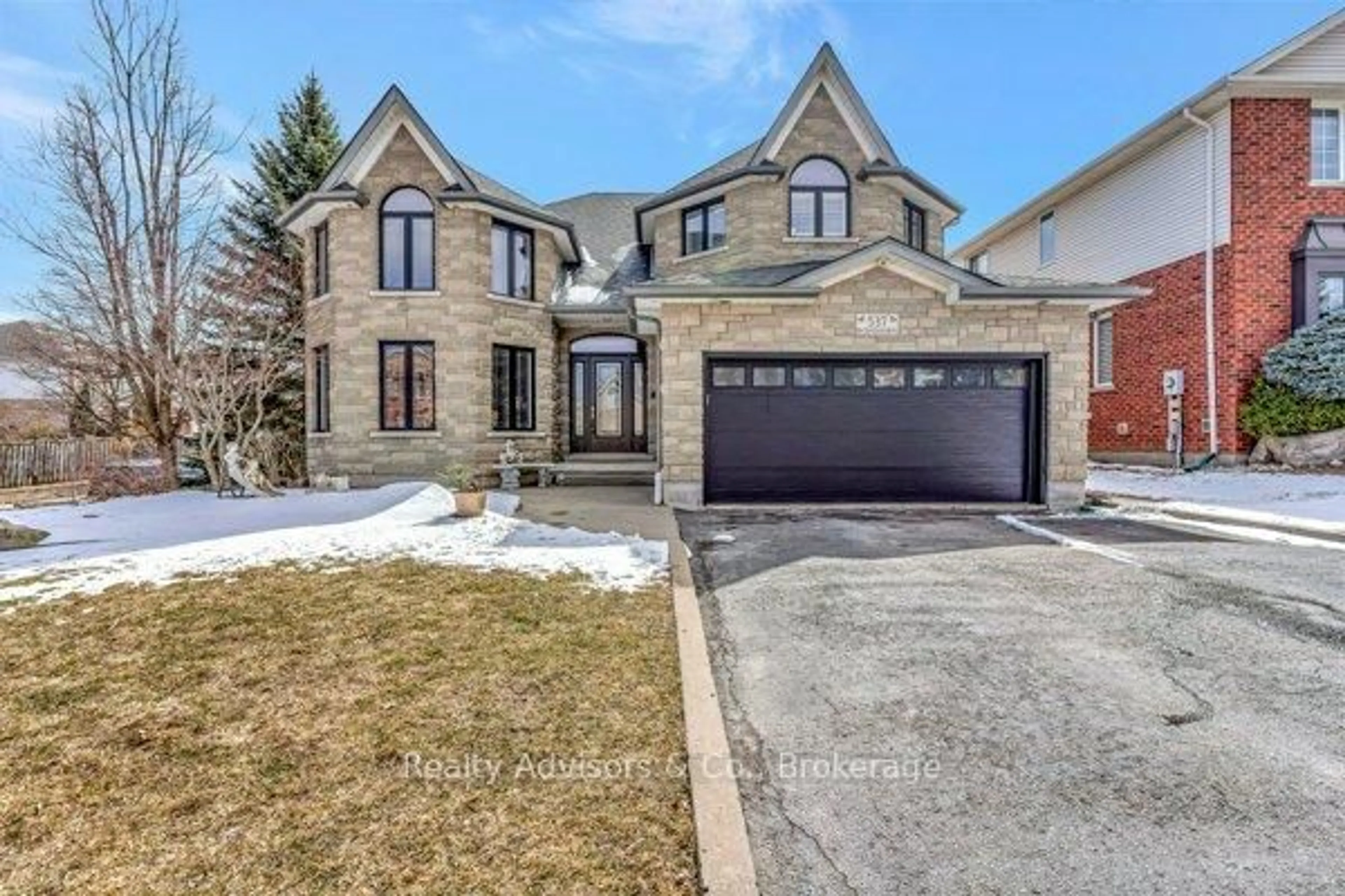 Home with brick exterior material, street for 537 Buckingham Blvd, Waterloo Ontario N2T 2V1