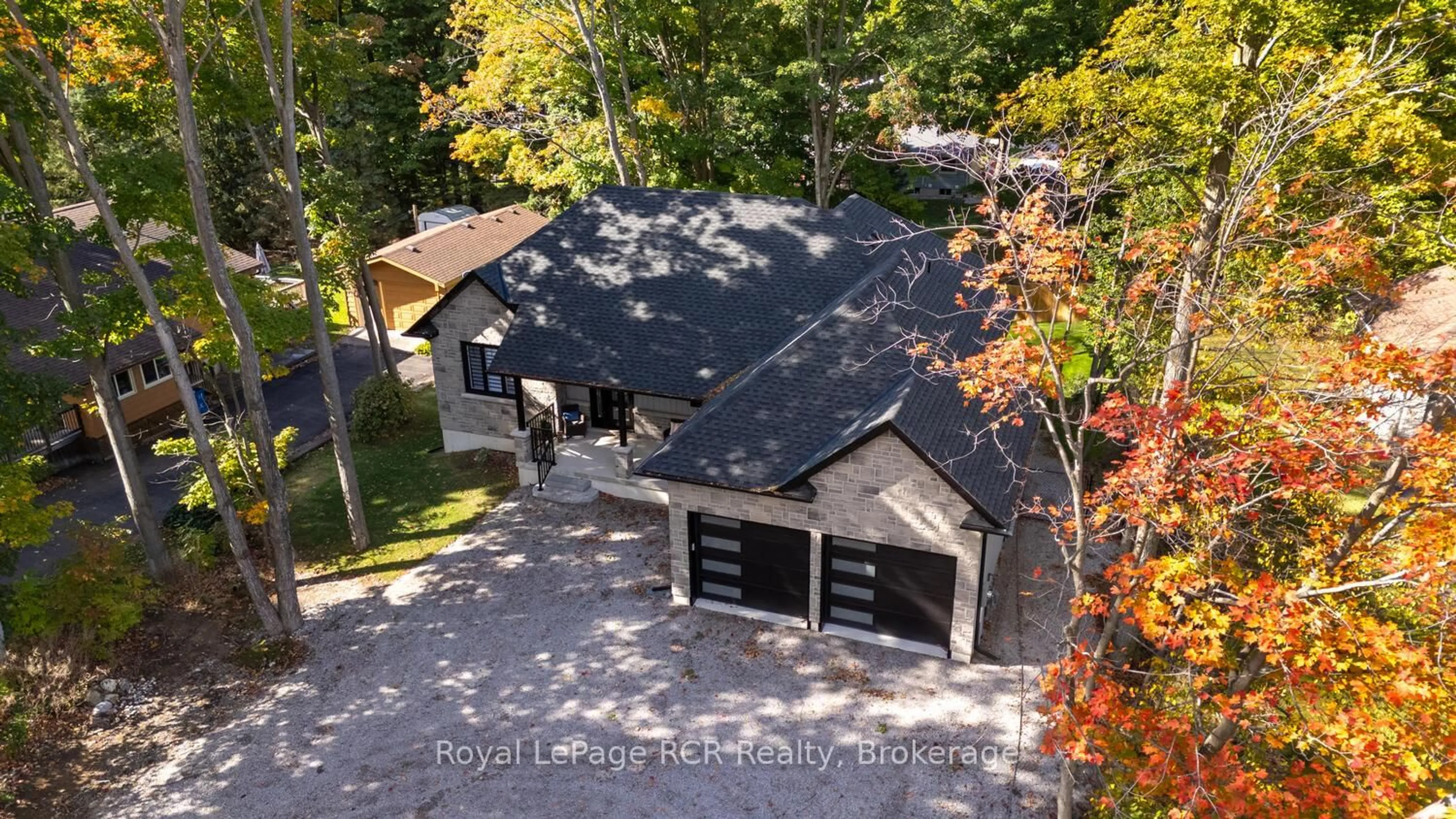 A pic from outside/outdoor area/front of a property/back of a property/a pic from drone, street for 83 Lakeland Dr, South Bruce Peninsula Ontario N0H 2G0