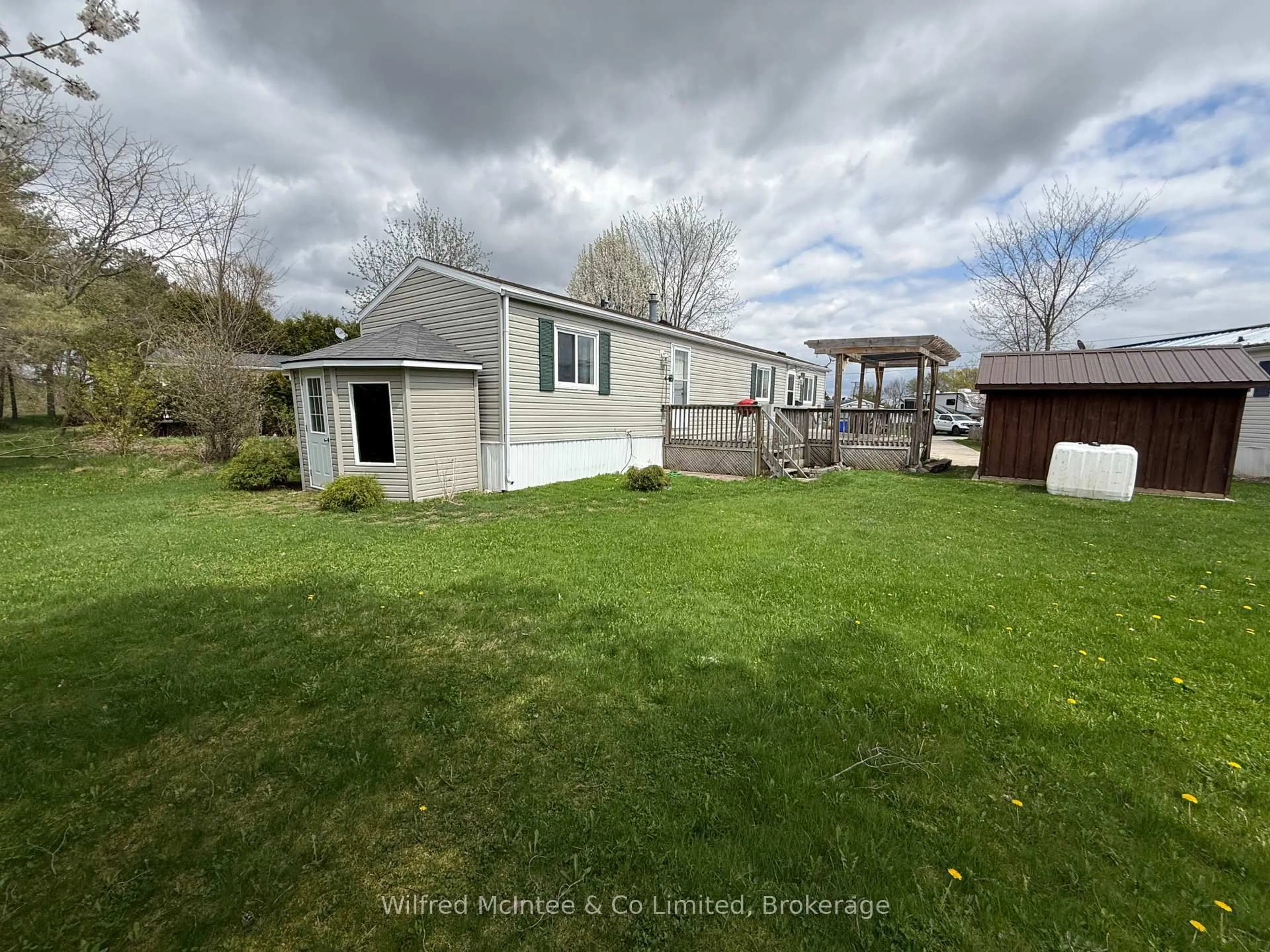 A pic from outside/outdoor area/front of a property/back of a property/a pic from drone, water/lake/river/ocean view for 19 Dove Rd, Brockton Ontario N0G 2V0