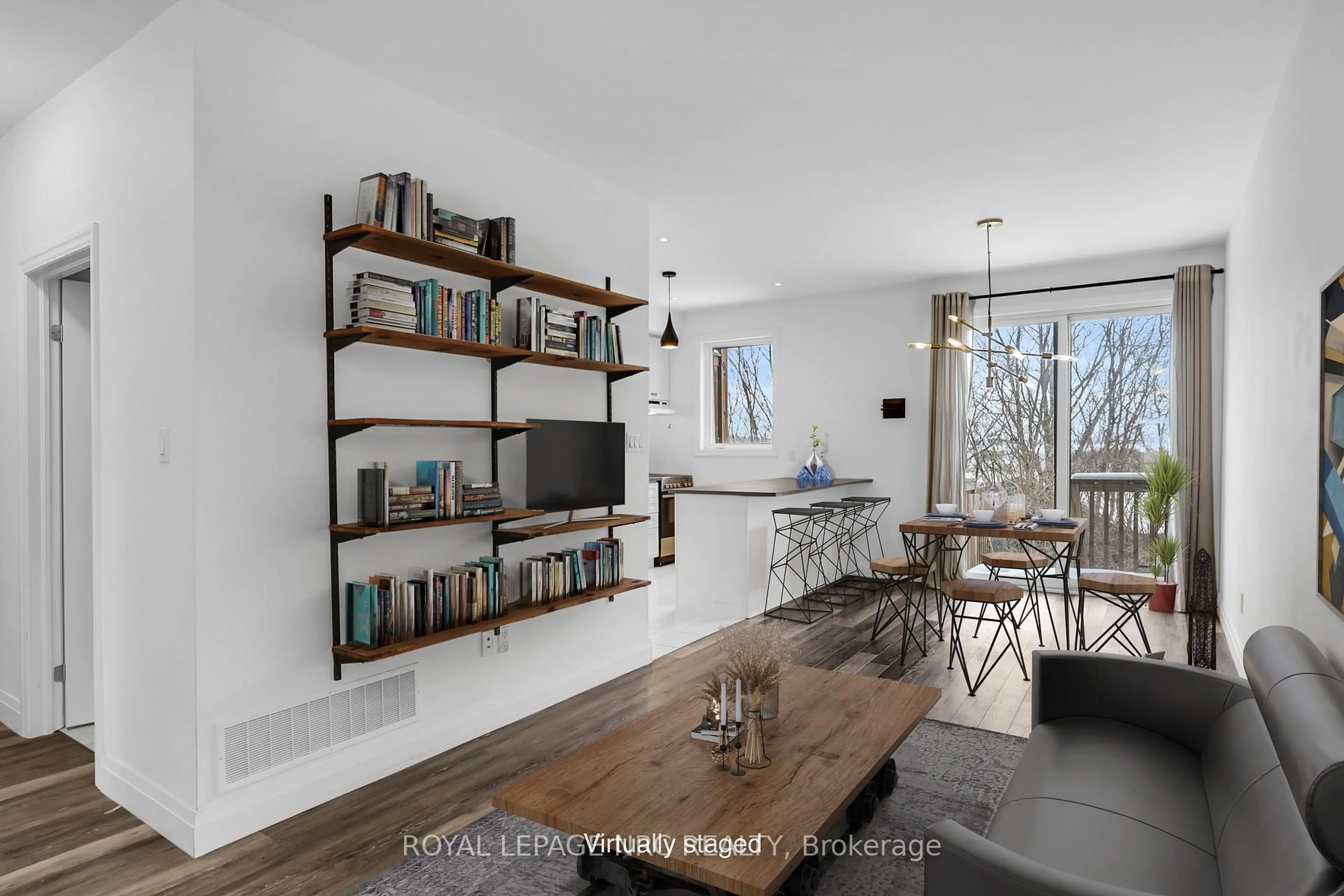Living room with furniture, wood/laminate floor for 290 Barton St #30, Hamilton Ontario L8R 3P3