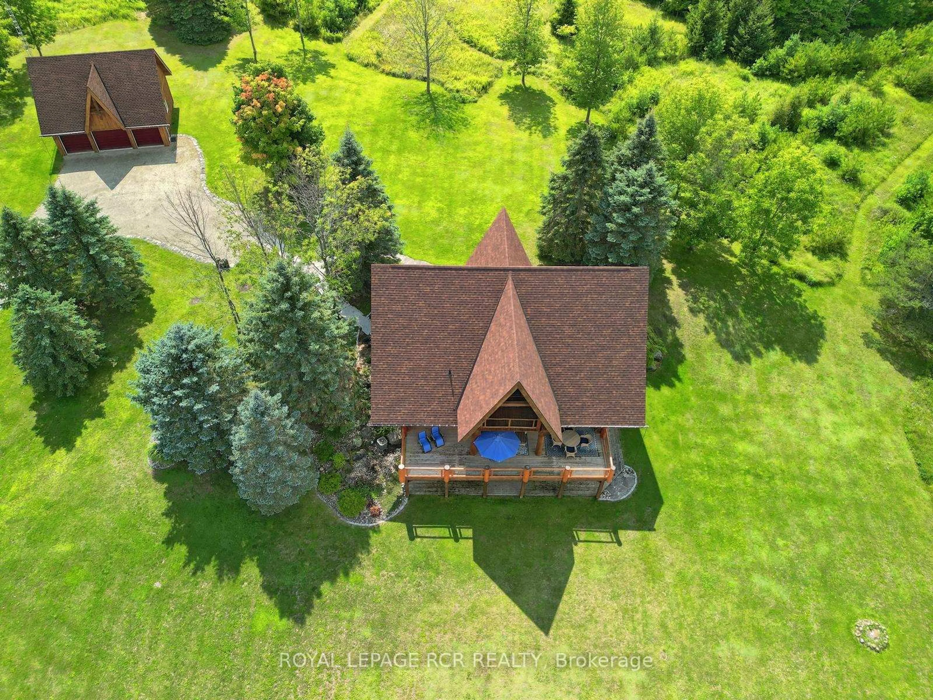 A pic from outside/outdoor area/front of a property/back of a property/a pic from drone, forest/trees view for 757402 2nd Line, Mulmur Ontario L9V 2V8
