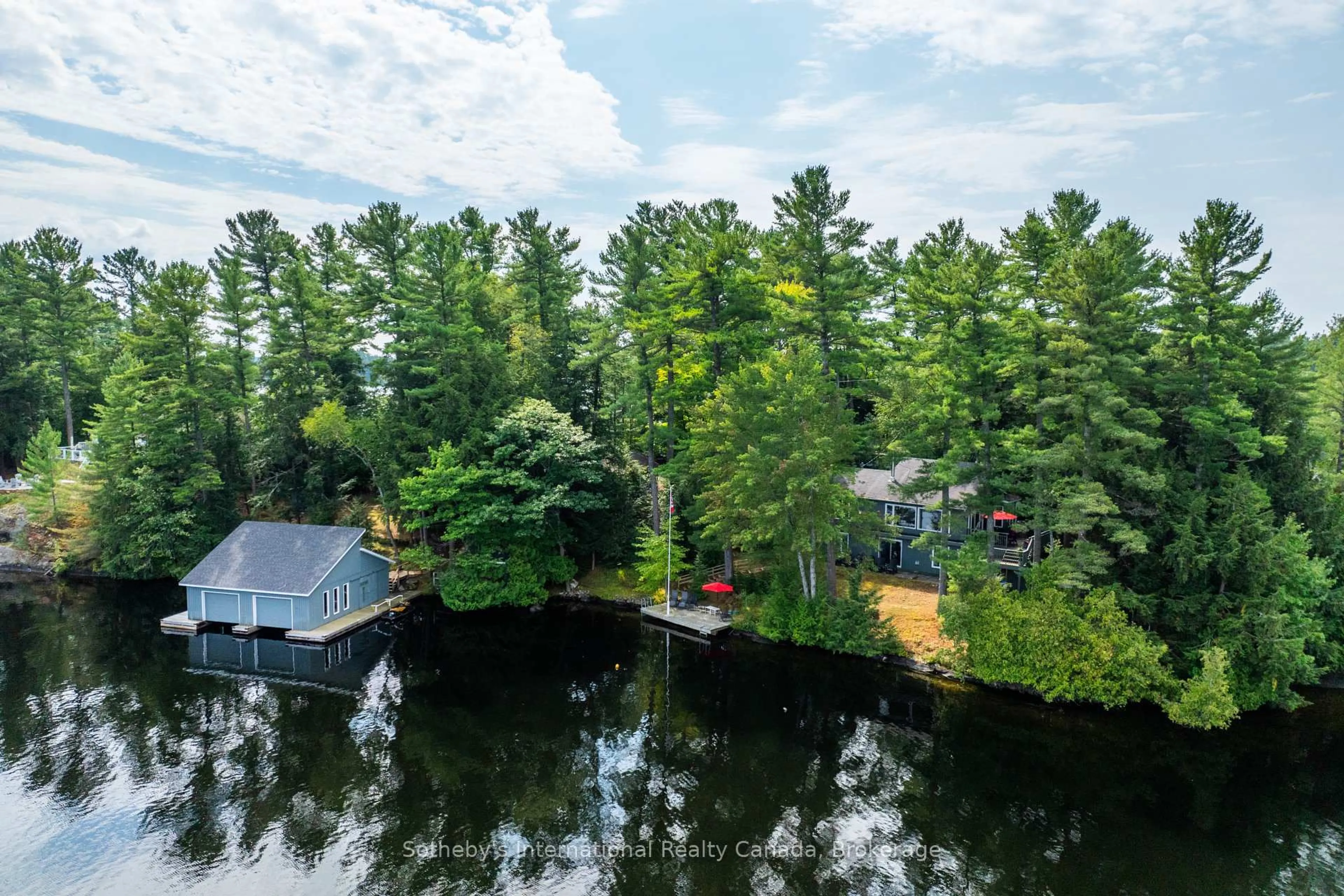 A pic from outside/outdoor area/front of a property/back of a property/a pic from drone, water/lake/river/ocean view for 1153 Acton Island Rd, Muskoka Lakes Ontario P0C 1A0