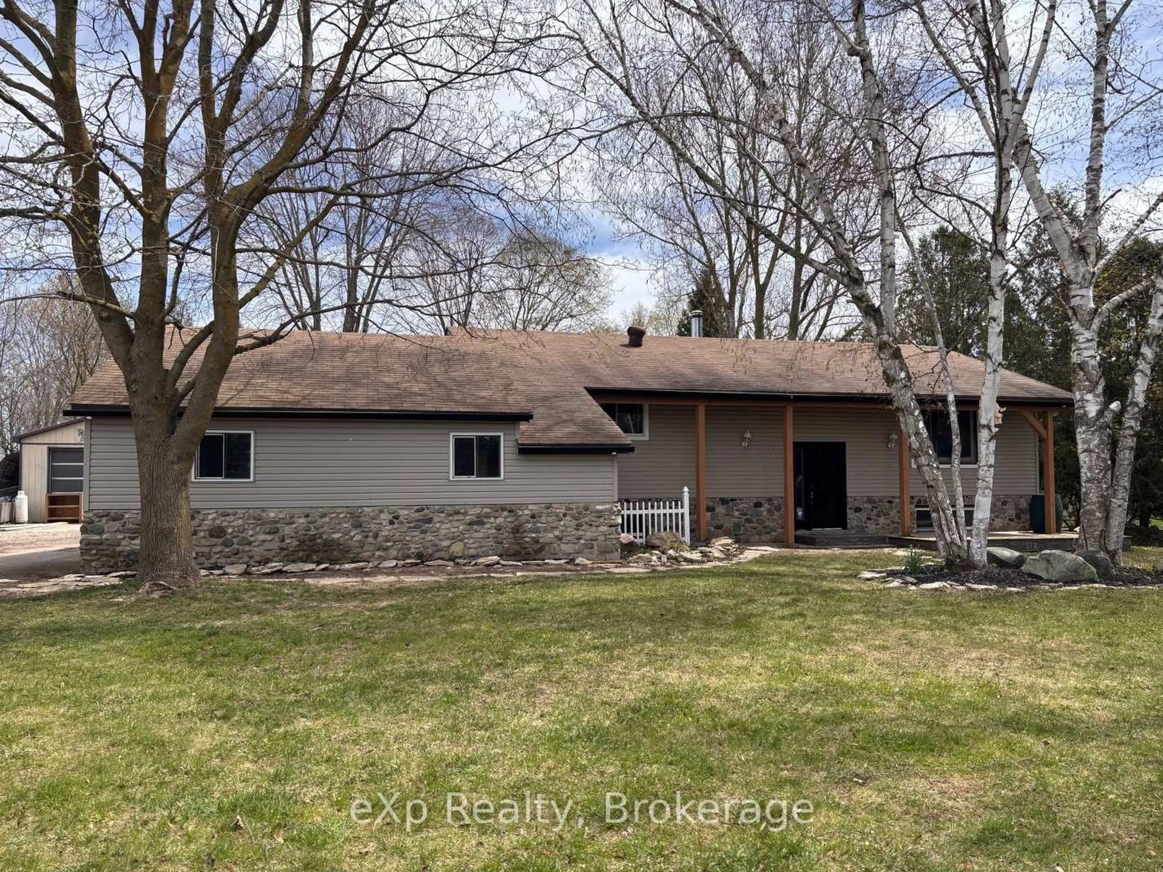 A pic from outside/outdoor area/front of a property/back of a property/a pic from drone, water/lake/river/ocean view for 572 Louisa St, West Grey Ontario N0G 1C0