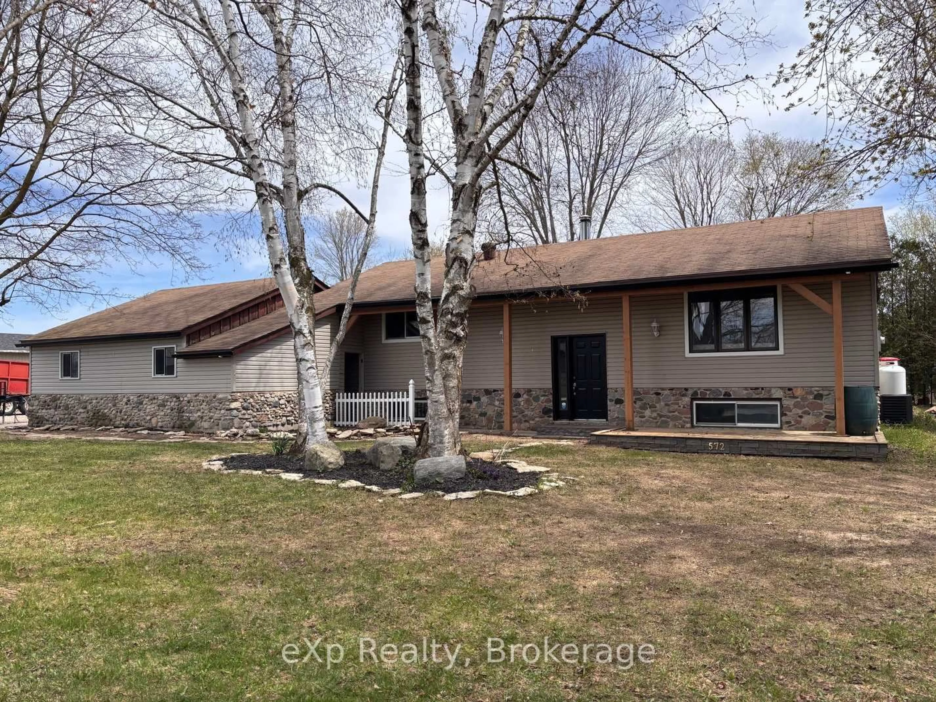 A pic from outside/outdoor area/front of a property/back of a property/a pic from drone, water/lake/river/ocean view for 572 Louisa St, West Grey Ontario N0G 1C0